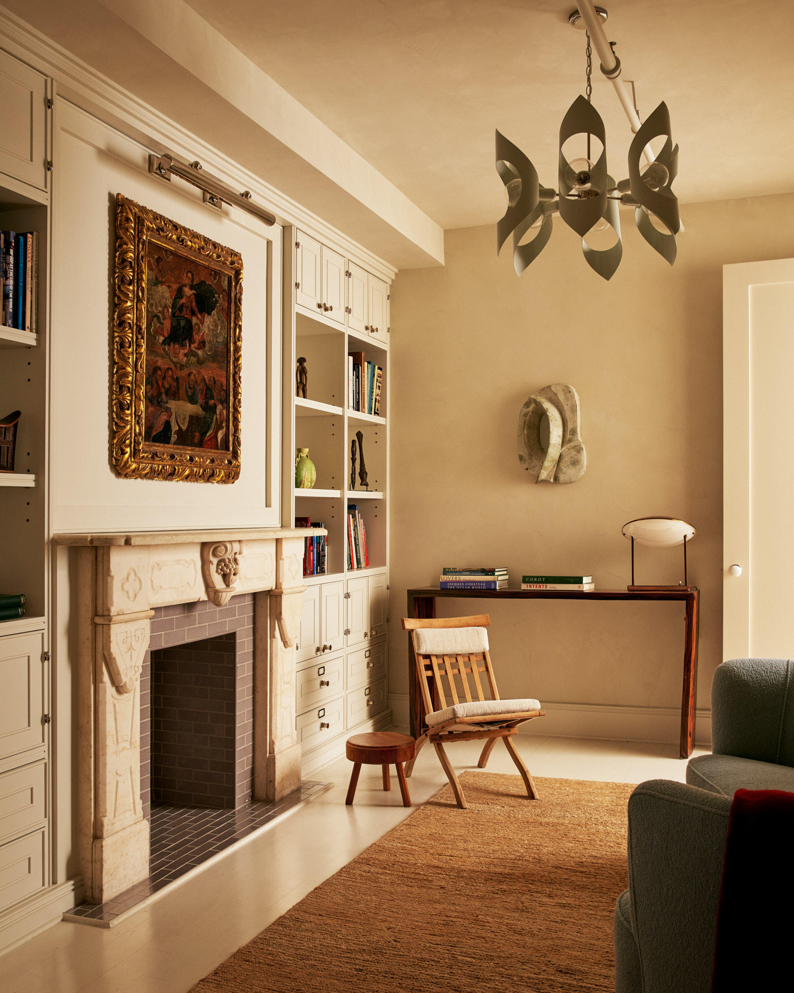 285 Lafayette Street, Unit 5D Manhattan, NY 10012 - Photo 17 of 22 a living room with furniture and a fireplace