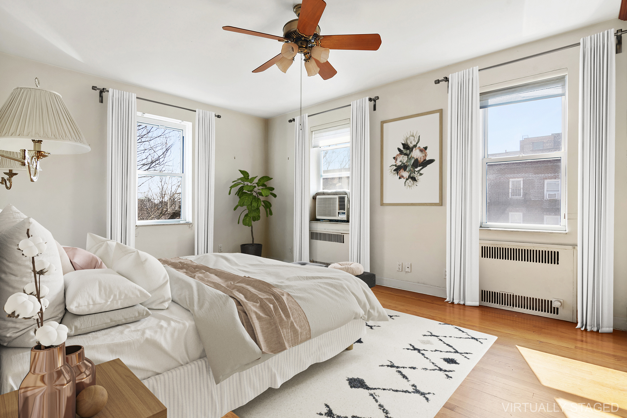 1615 Avenue I, Unit 603 Brooklyn, NY 11230 - Photo 6 of 13 a bedroom with a large bed and a window