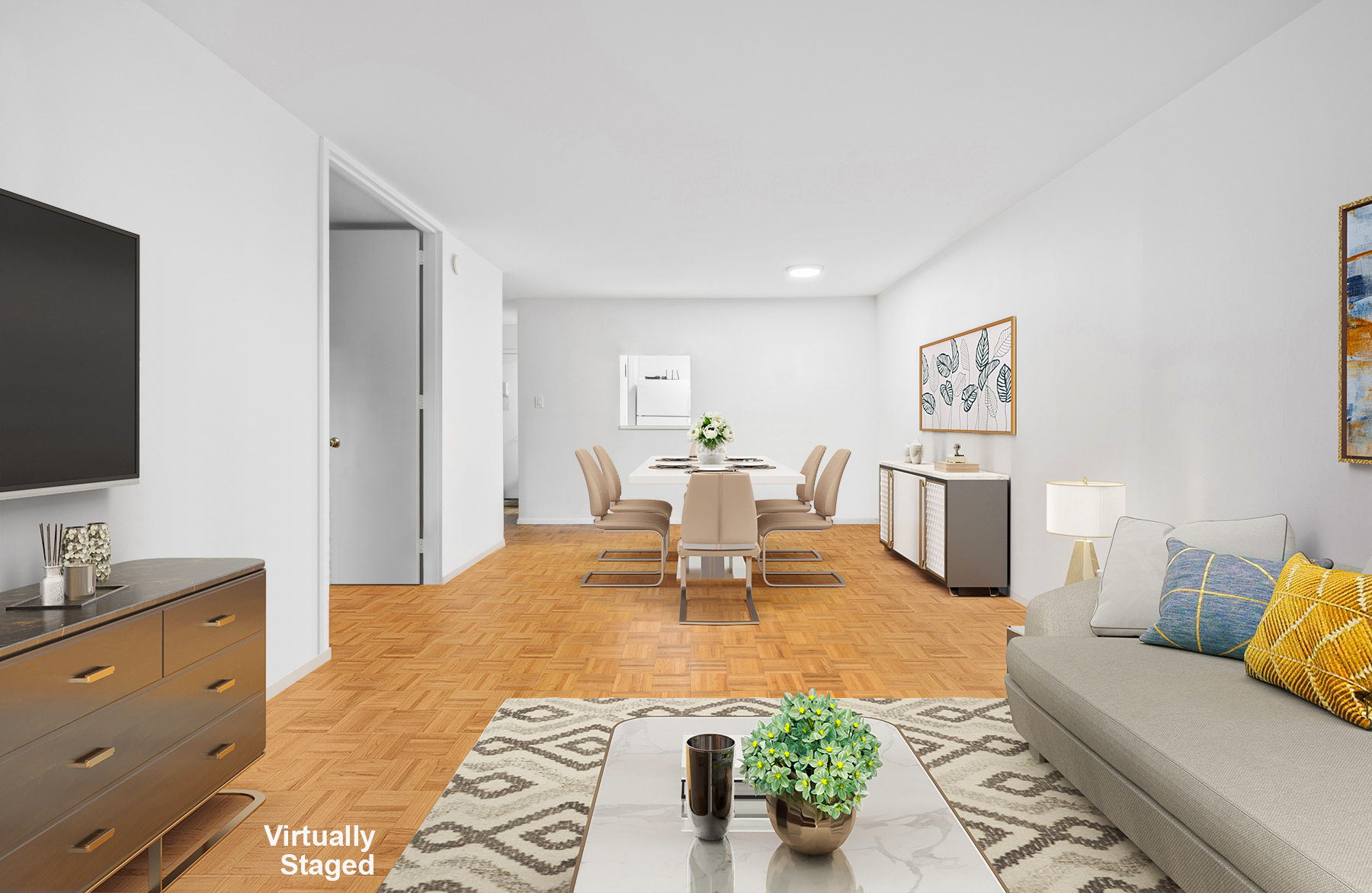 595 Main Street, Unit 315 Manhattan, NY 10044 - Photo 4 of 11 a living room with furniture and a flat screen tv