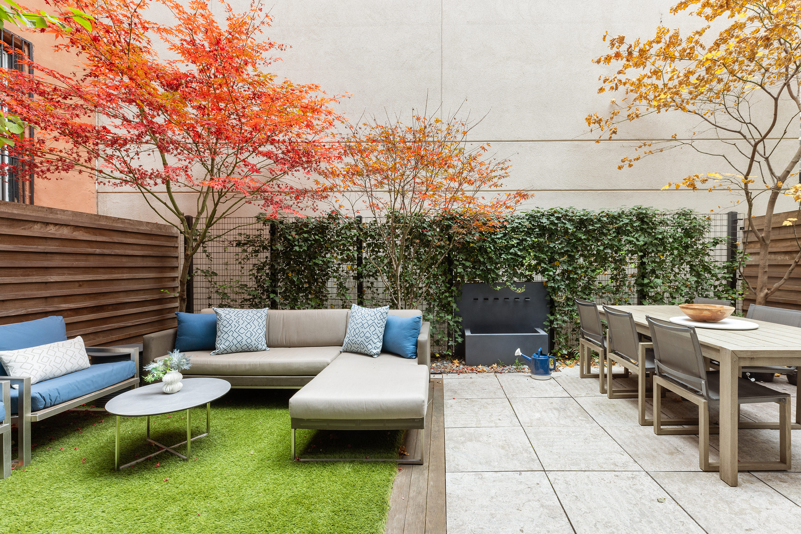 43 Dean Street Brooklyn, NY 11201 - Photo 15 of 17 a view of a patio with couches and a table and chairs with garden view