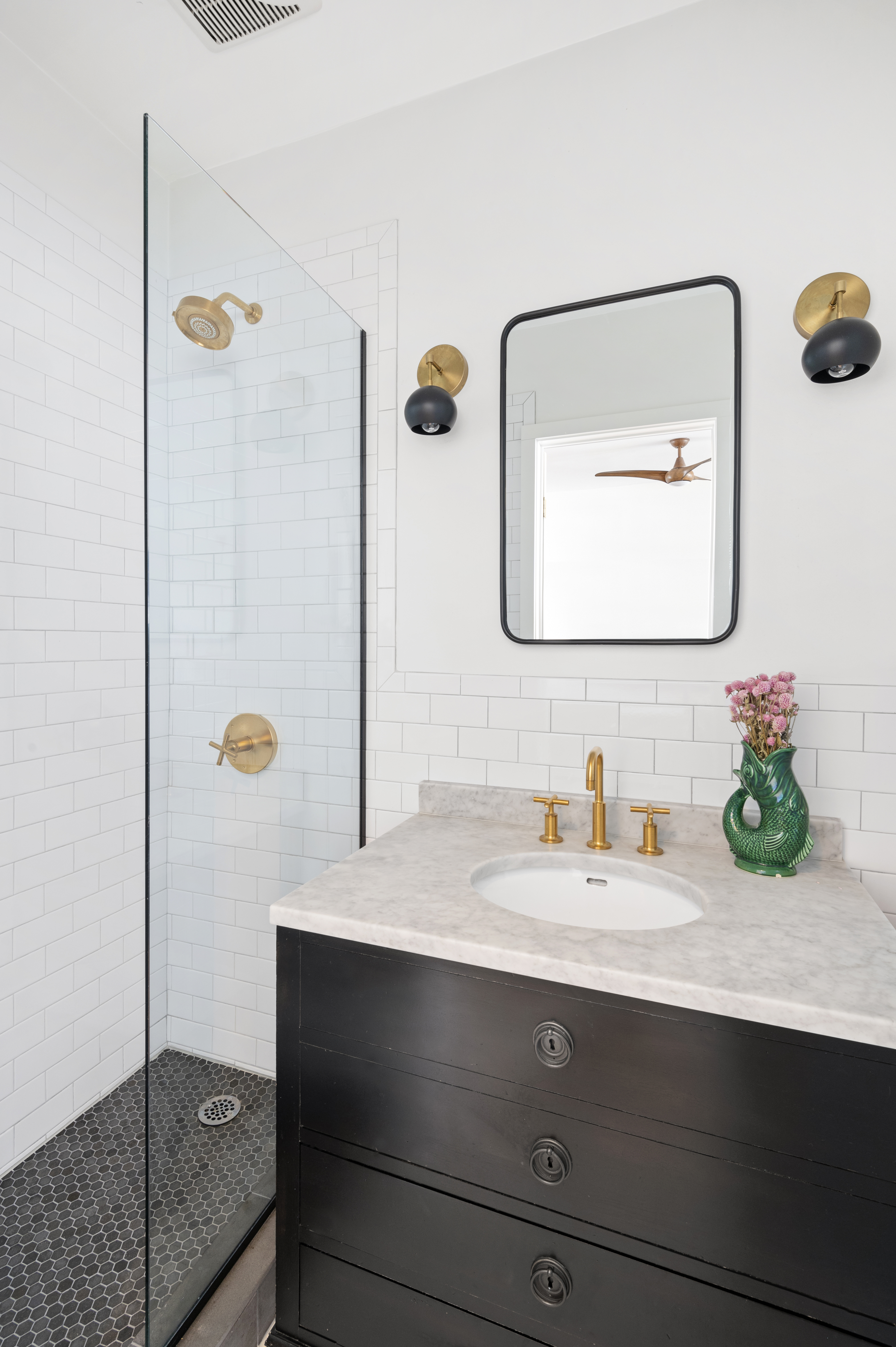 185 East 31st Street Brooklyn, NY 11226 - Photo 7 of 23 a bathroom with a sink and a mirror