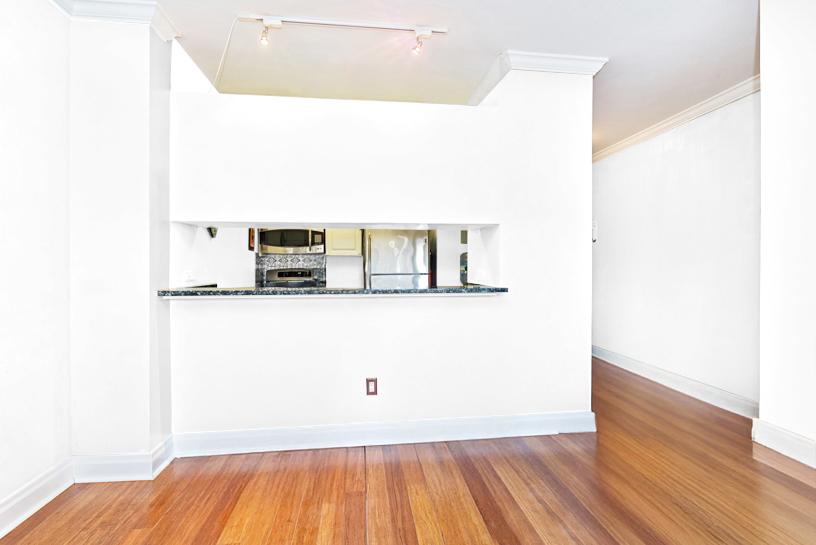 400 East 90th Street, Unit 7E Manhattan, NY 10128 - Photo 2 of 12 a view of a room with wooden floor