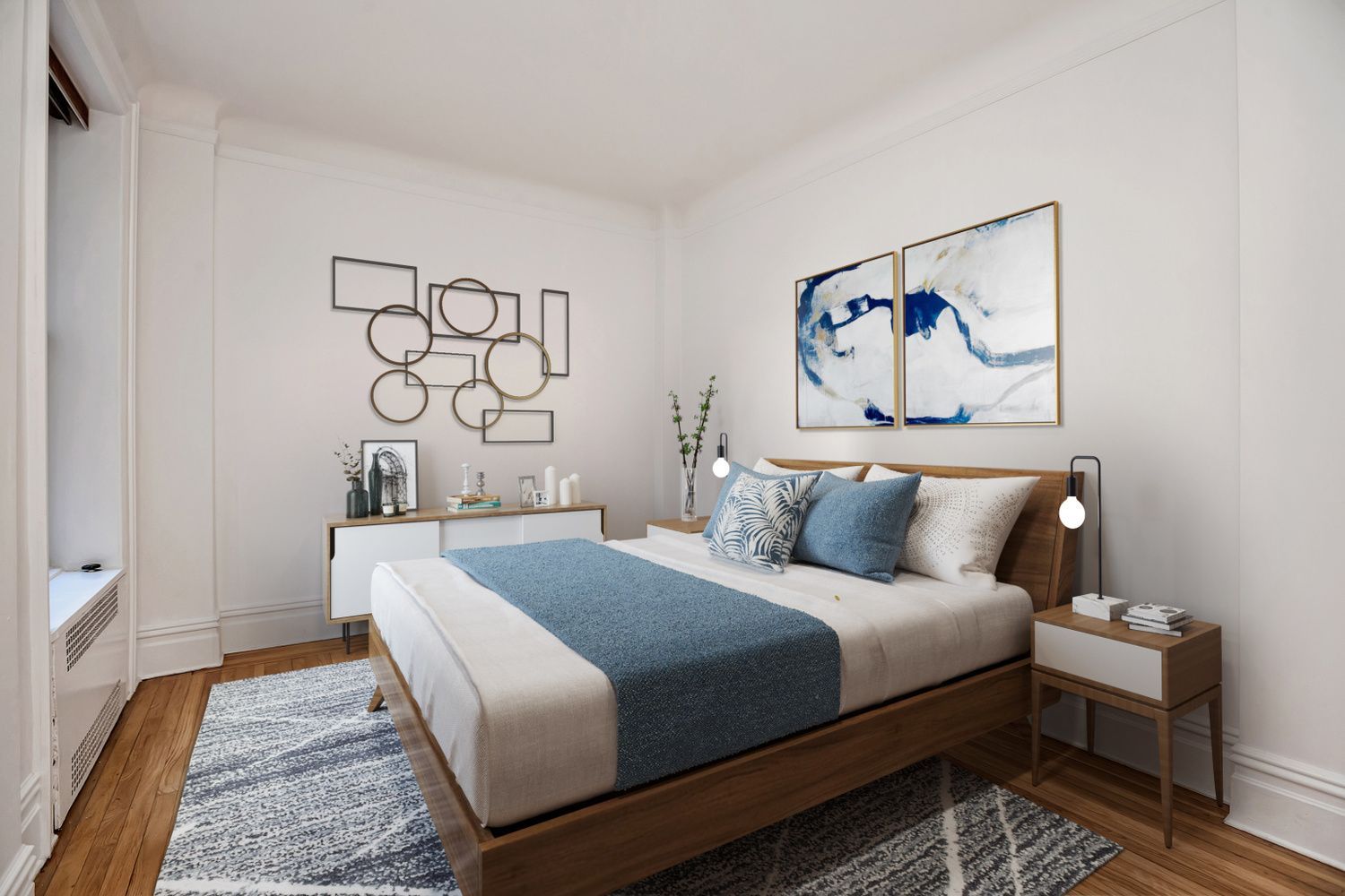 205 West 54th Street, Unit 2E Manhattan, NY 10019 - Photo 7 of 11 a bedroom with a bed and a painting on the wall