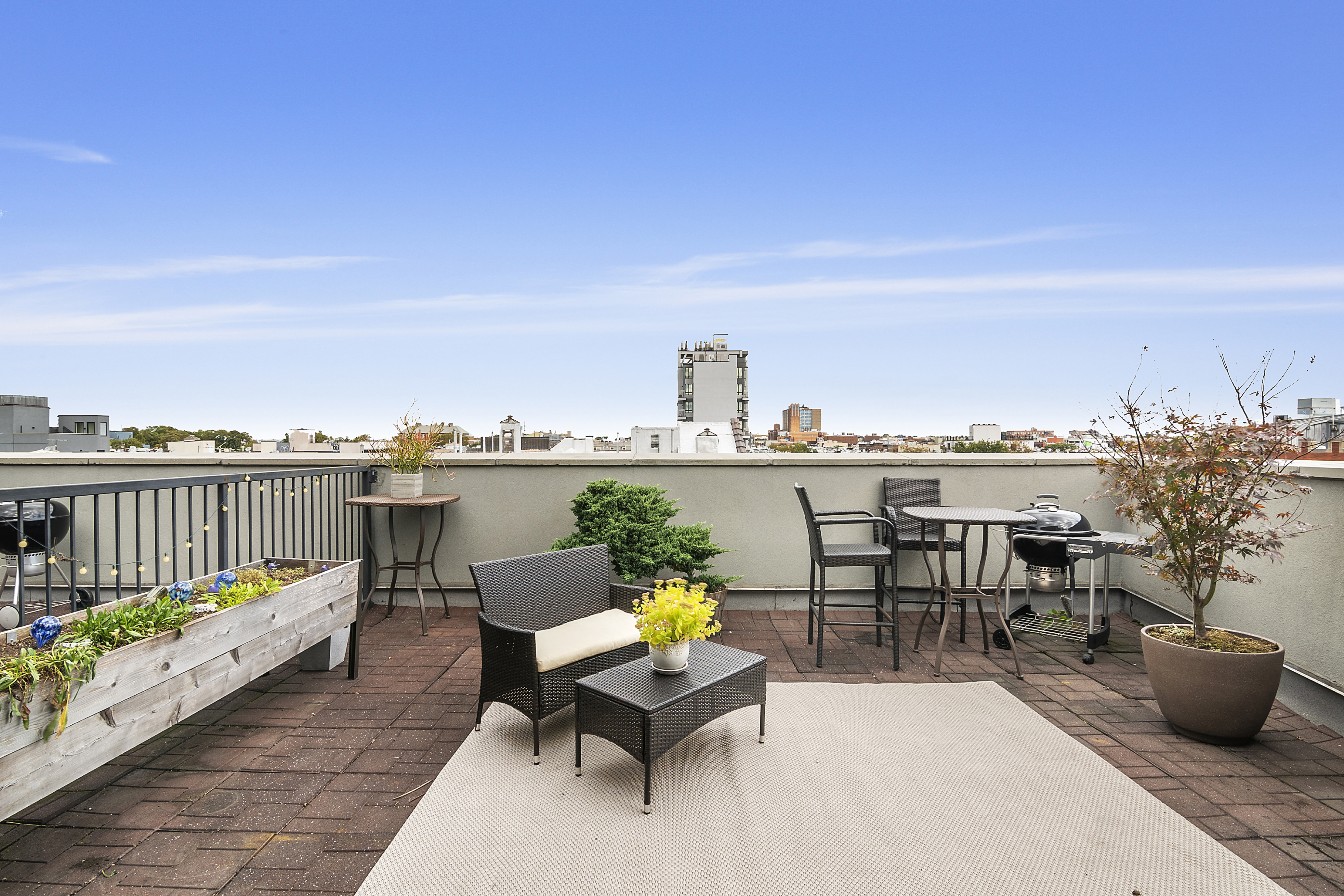 172 Wilson Avenue, Unit PHA Brooklyn, NY 11237 - Photo 8 of 14 a view of a terrace with furniture