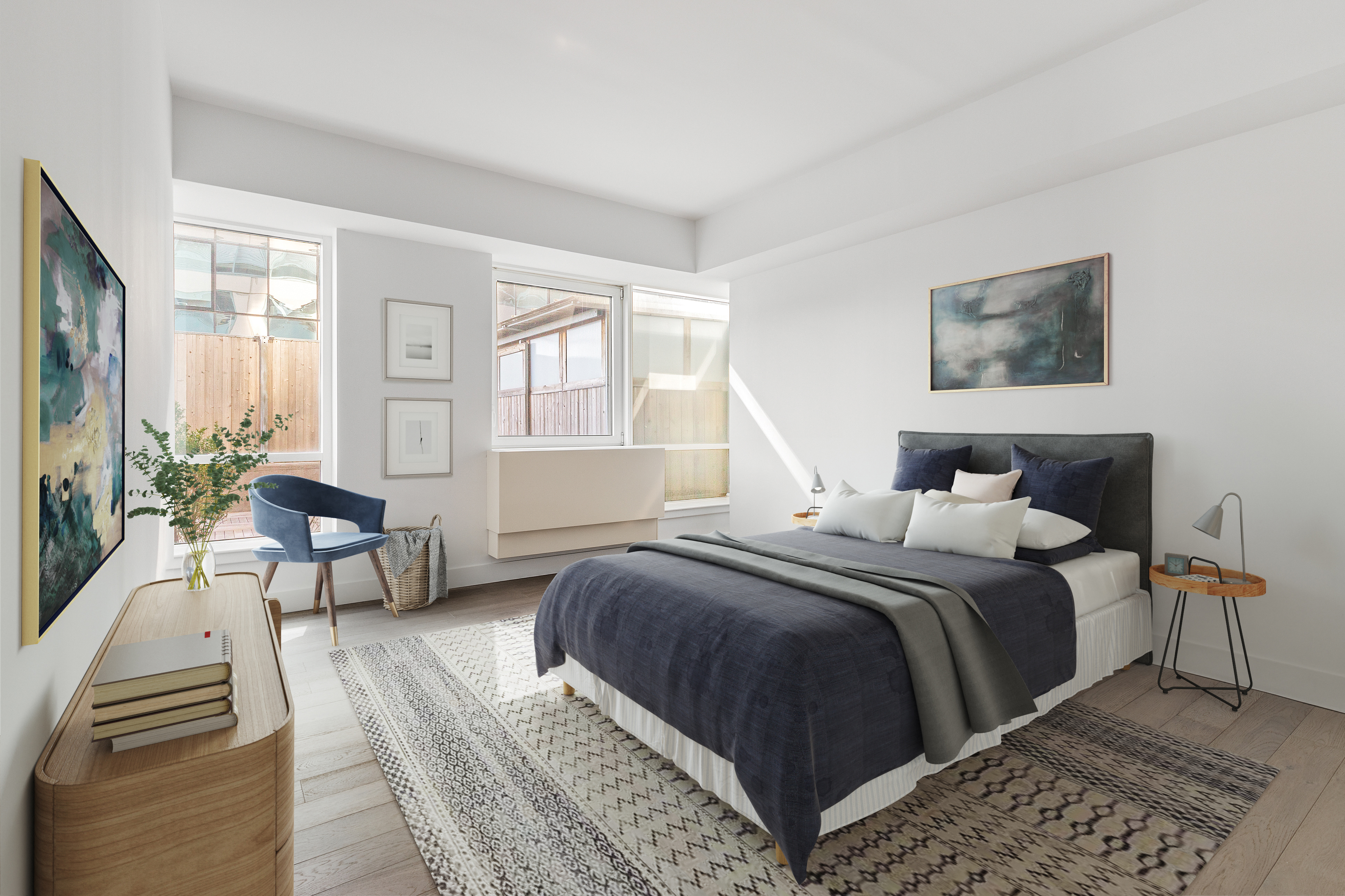 440 Kent Avenue, Unit 1B Brooklyn, NY 11249 - Photo 5 of 20 a bedroom with a bed and a couch