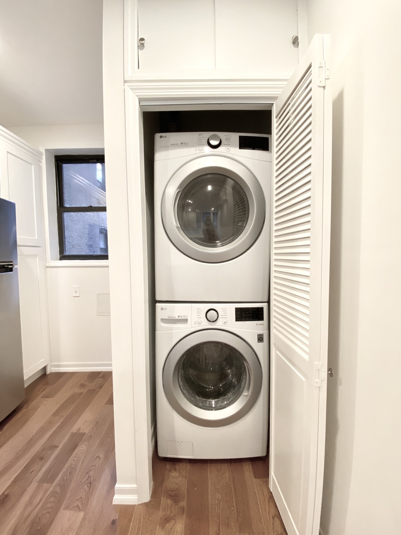 573 6th Street, Unit 1 Brooklyn, NY 11215 - Photo 3 of 10 a utility room with dryer and washer