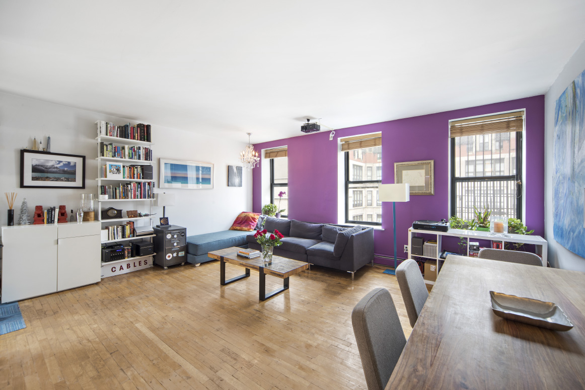 319 East 105th Street, Unit 5A Manhattan, NY 10029 - Photo 1 of 13 a living room with furniture and a window