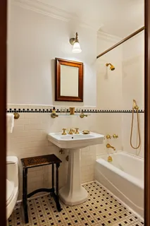 a bathroom with a sink a bathtub and a shower