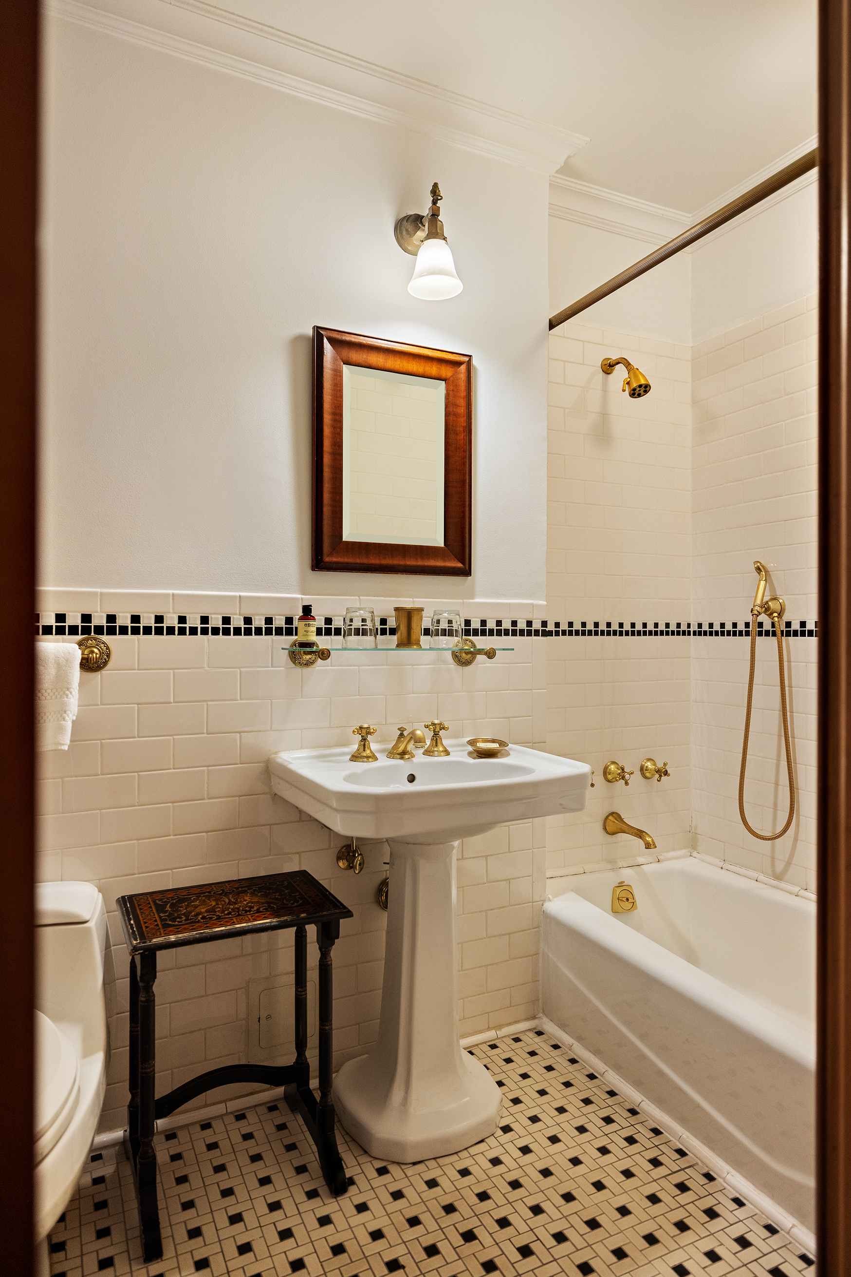 54 Irving Place, Unit 1 Manhattan, NY 10003 - Photo 5 of 11 a bathroom with a sink a bathtub and a shower