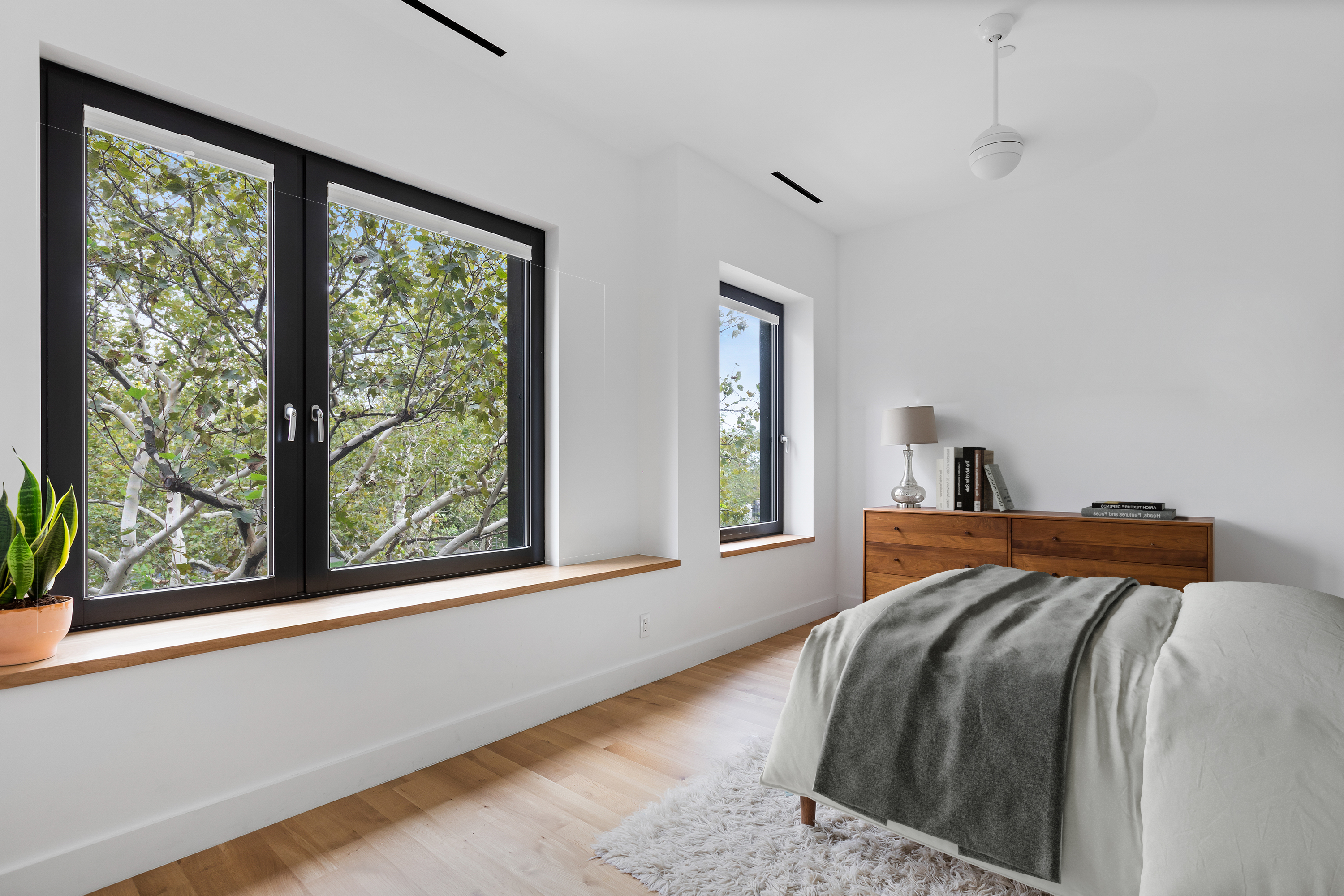 42 Sharon Street Brooklyn, NY 11211 - Photo 15 of 28 a bedroom with a bed and a window