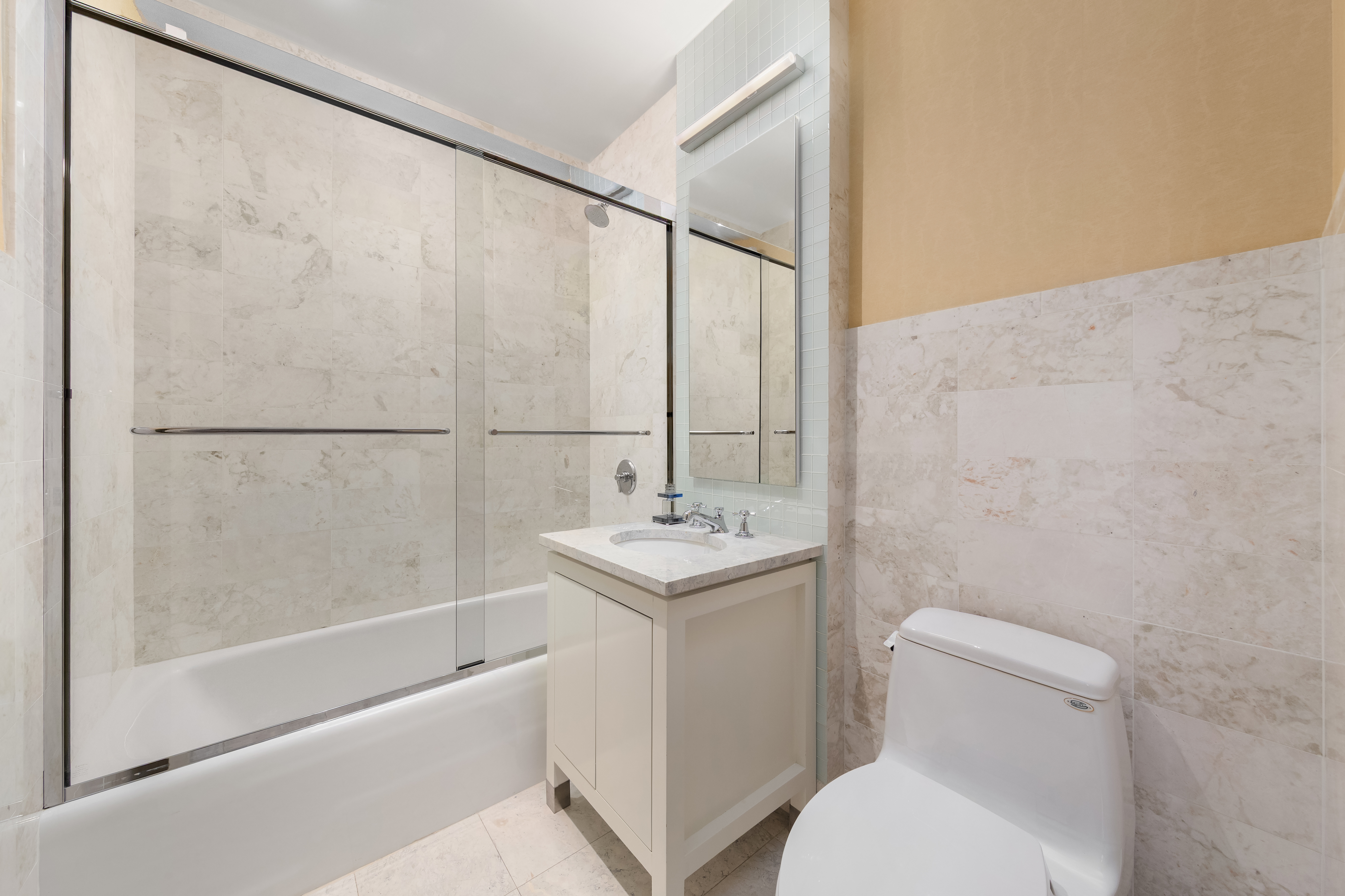 300 East 55th Street, Unit PHC Manhattan, NY 10022 - Photo 16 of 21 a bathroom with a sink a toilet and a bathtub