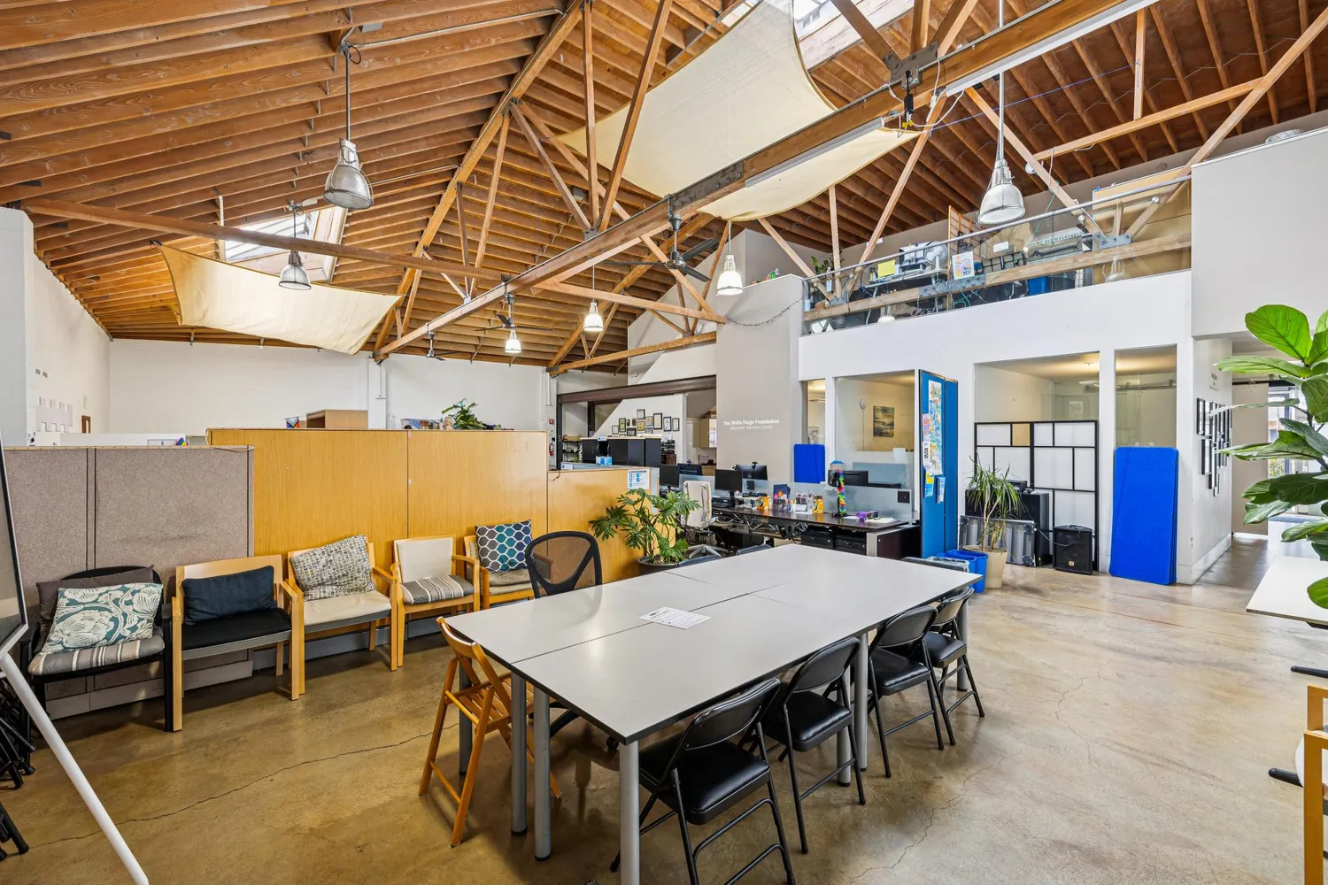 a view of a tables and chairs in a patio