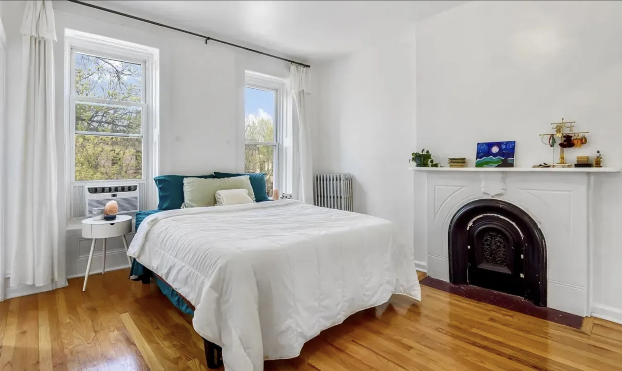 582 Monroe Street, Unit 2 Brooklyn, NY 11221 - Photo 6 of 18 a spacious bedroom with a bed and a window