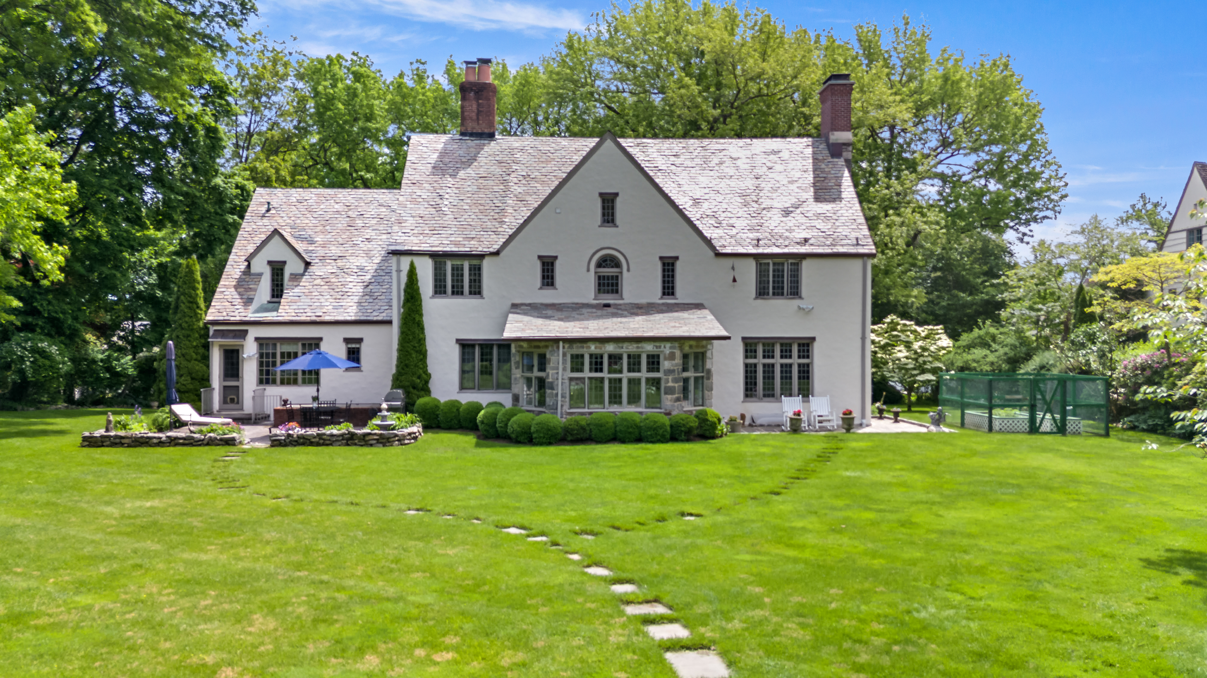 19 Avon Road Larchmont, NY 10538 - Photo 28 of 35 a view of a house with a yard