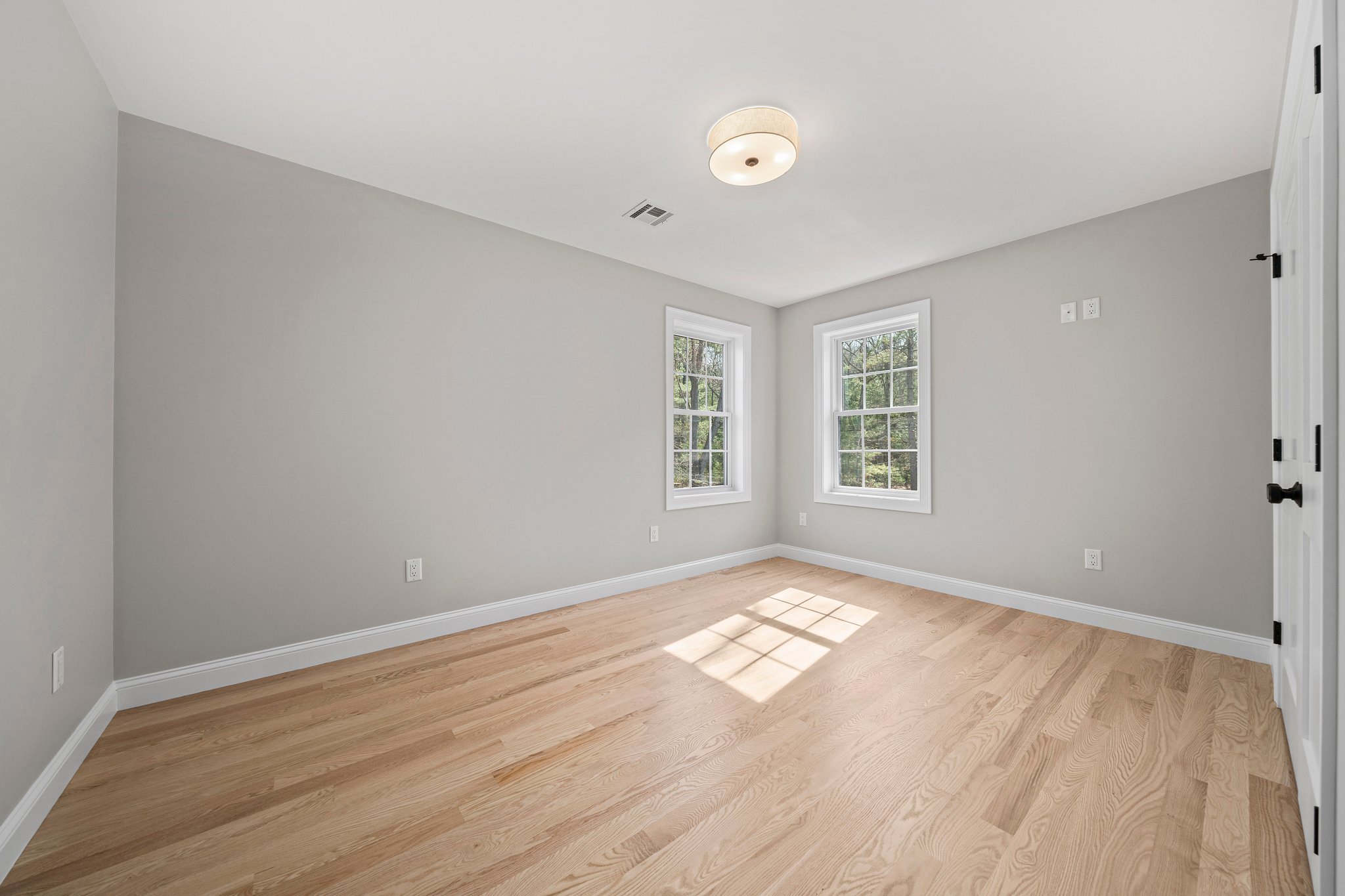 3 Everendon Road Canton, MA 02021 - Photo 27 of 35 a view of an empty room with wooden floor and a window