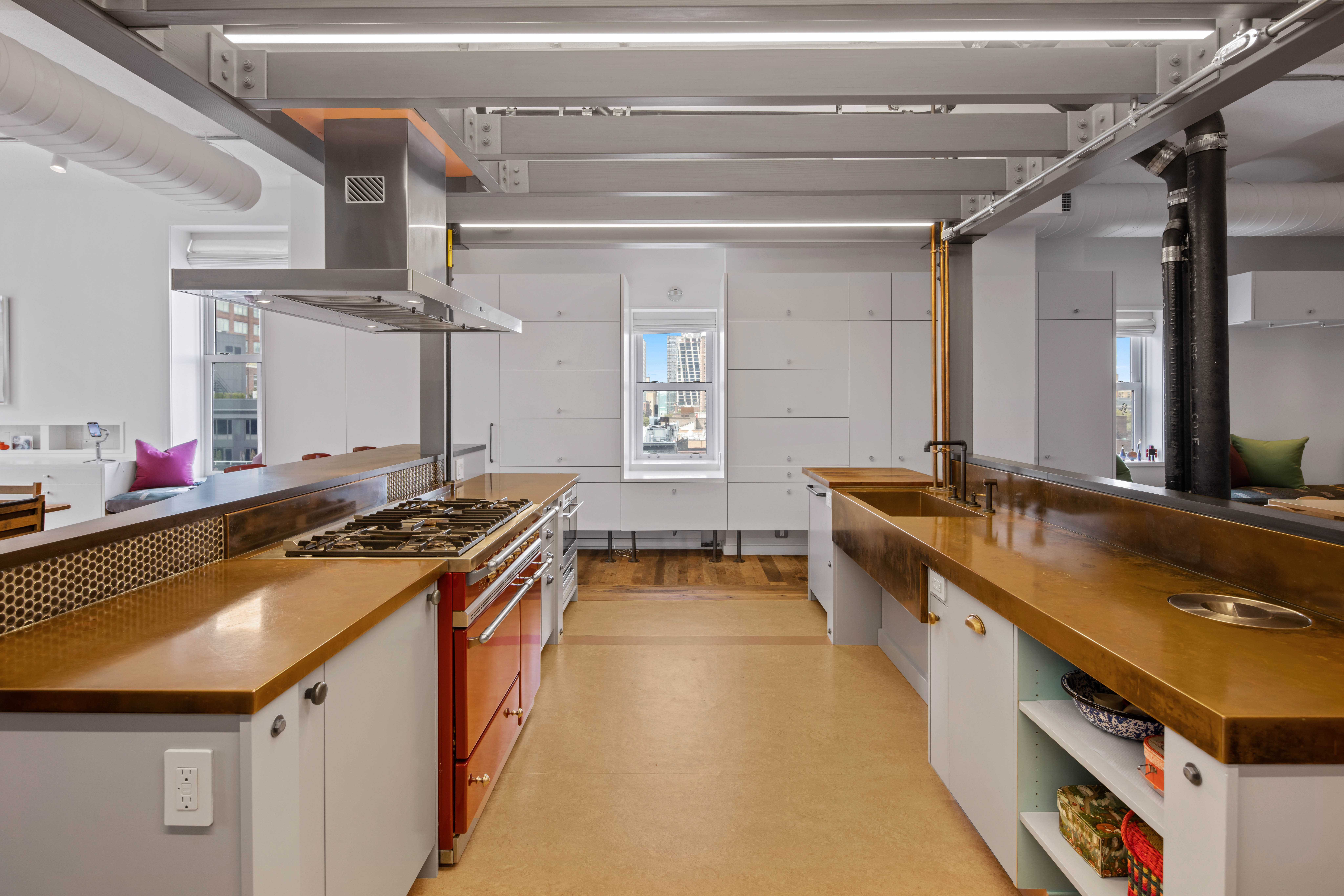 257 West 17th Street, Unit 7AB Manhattan, NY 10011 - Photo 8 of 21 a kitchen with stainless steel appliances granite countertop a sink and stove