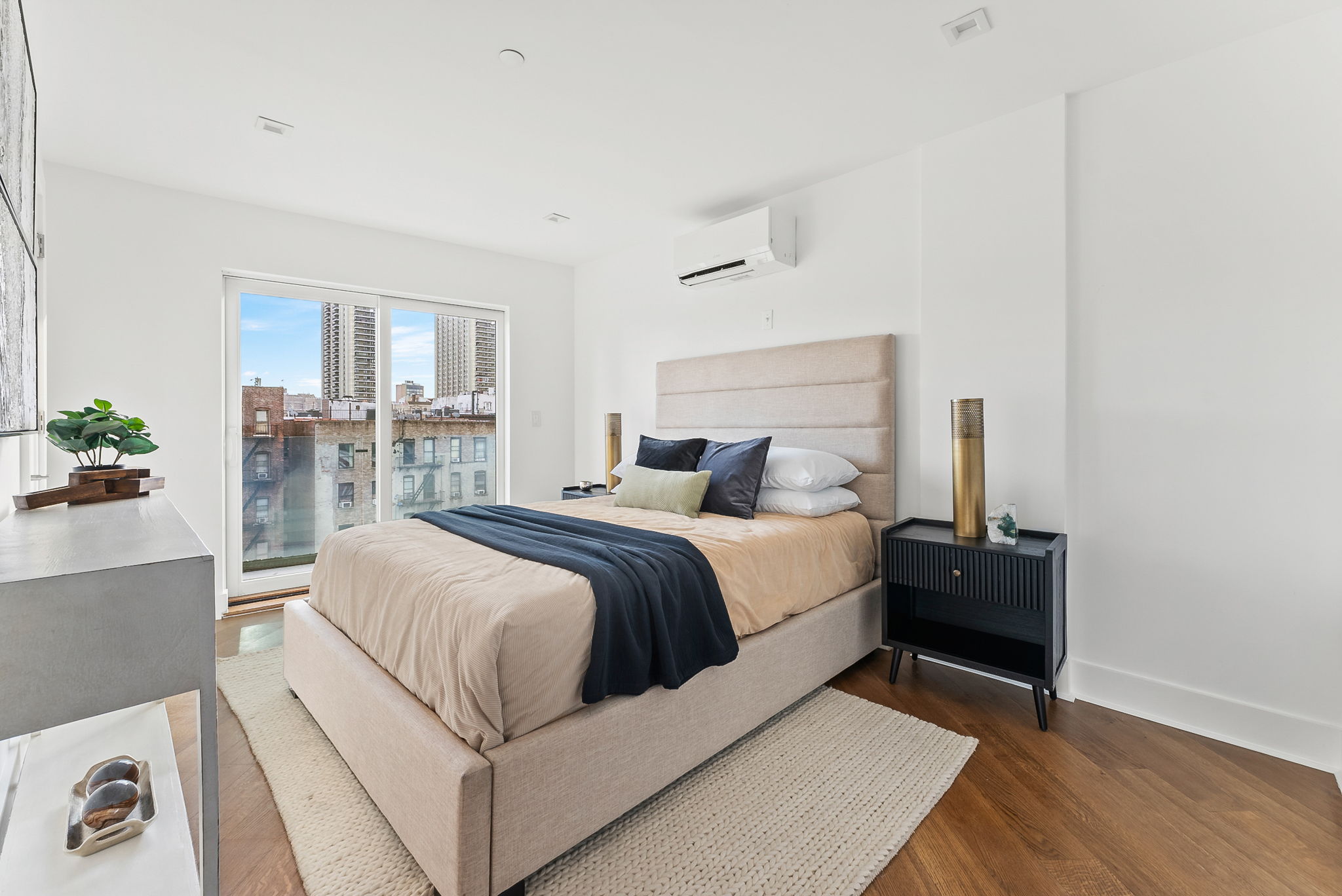 553 West 182nd Street, Unit 5R Manhattan, NY 10033 - Photo 8 of 12 a bedroom with a bed and window