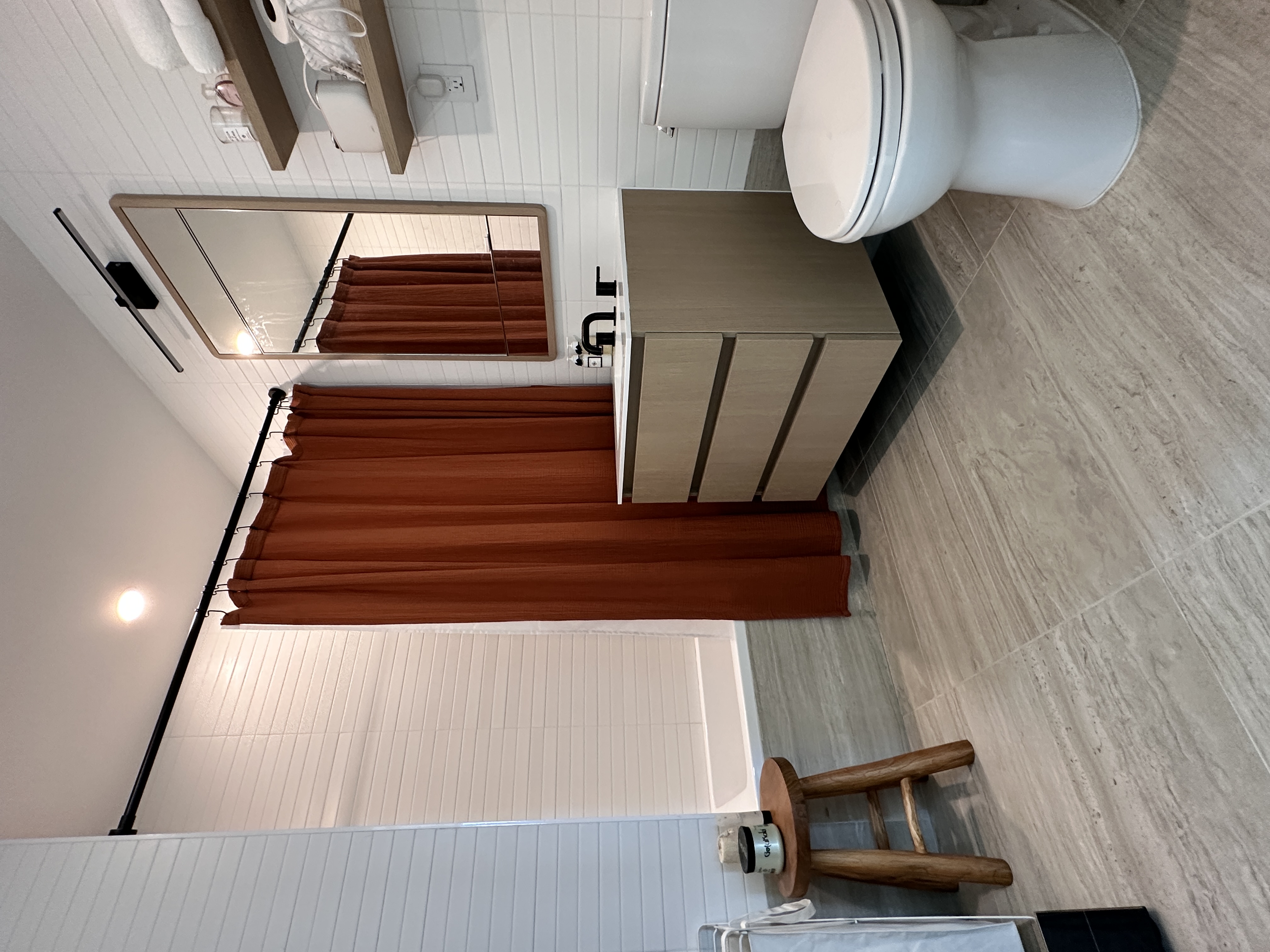 4507 Court Square West, Unit 10E Queens, NY 11101 - Photo 8 of 14 a bathroom with a sink toilet and mirror