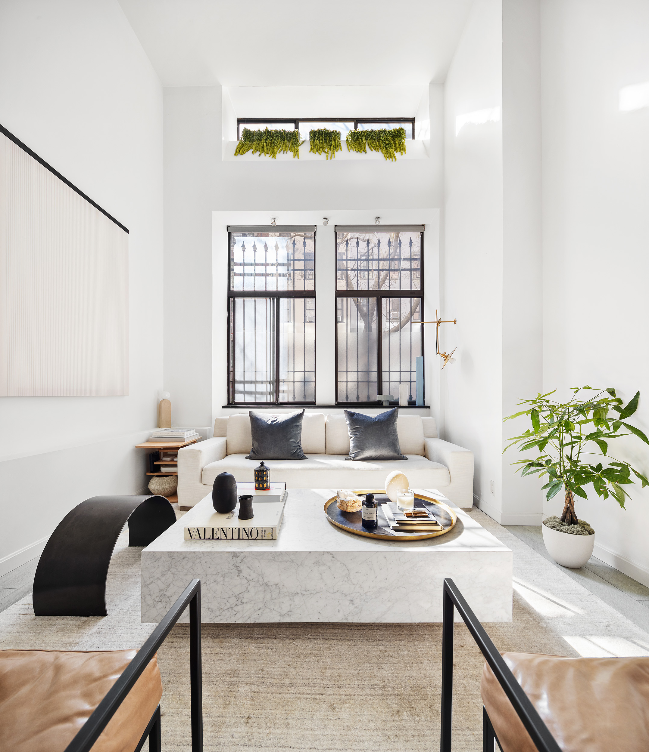 155 West 15th Street, Unit 1J Manhattan, NY 10011 - Photo 2 of 13 a view of a workspace with a window