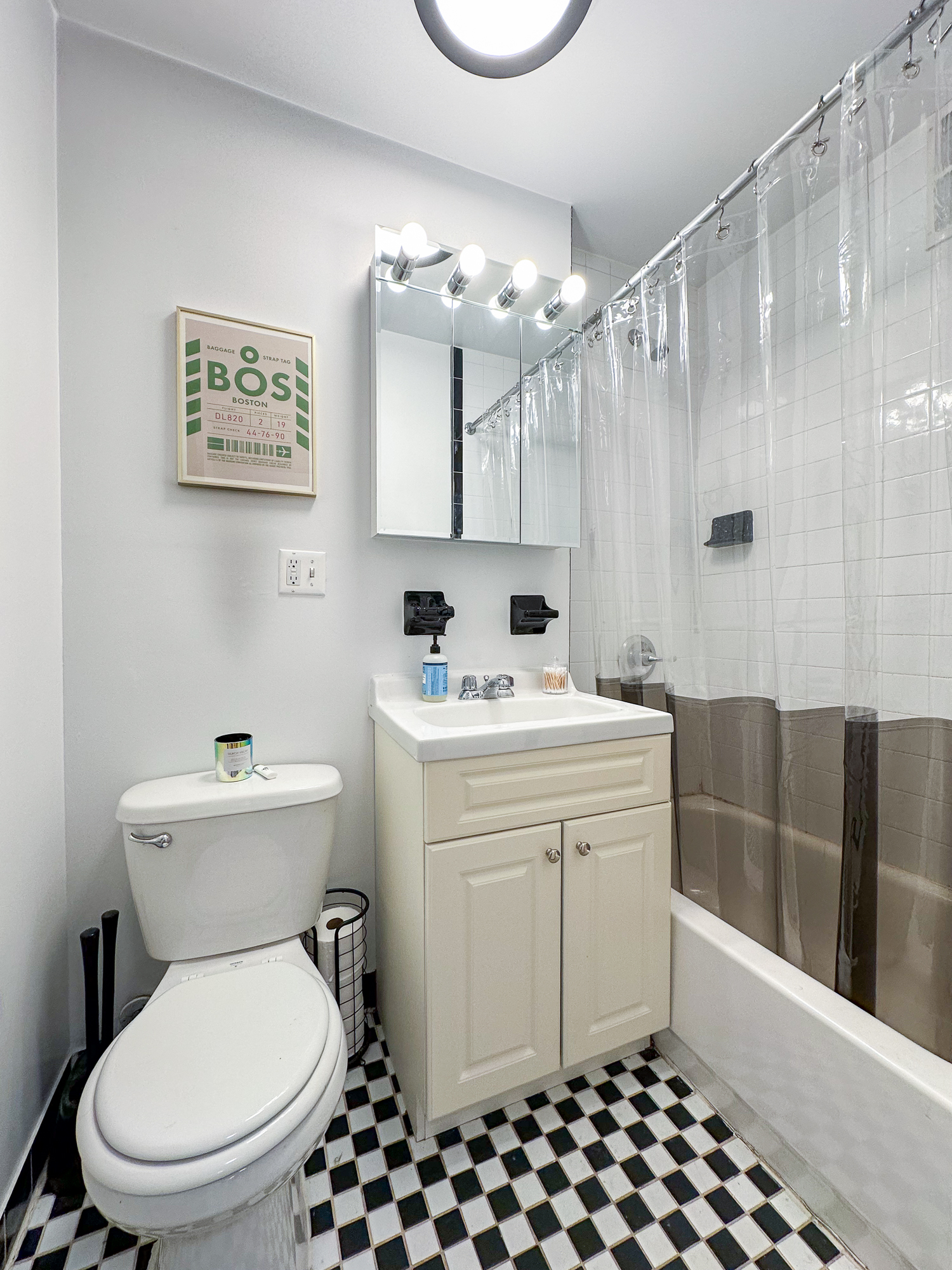 315 East 5th Street, Unit 5E Manhattan, NY 10003 - Photo 6 of 11 a bathroom with a sink toilet and shower