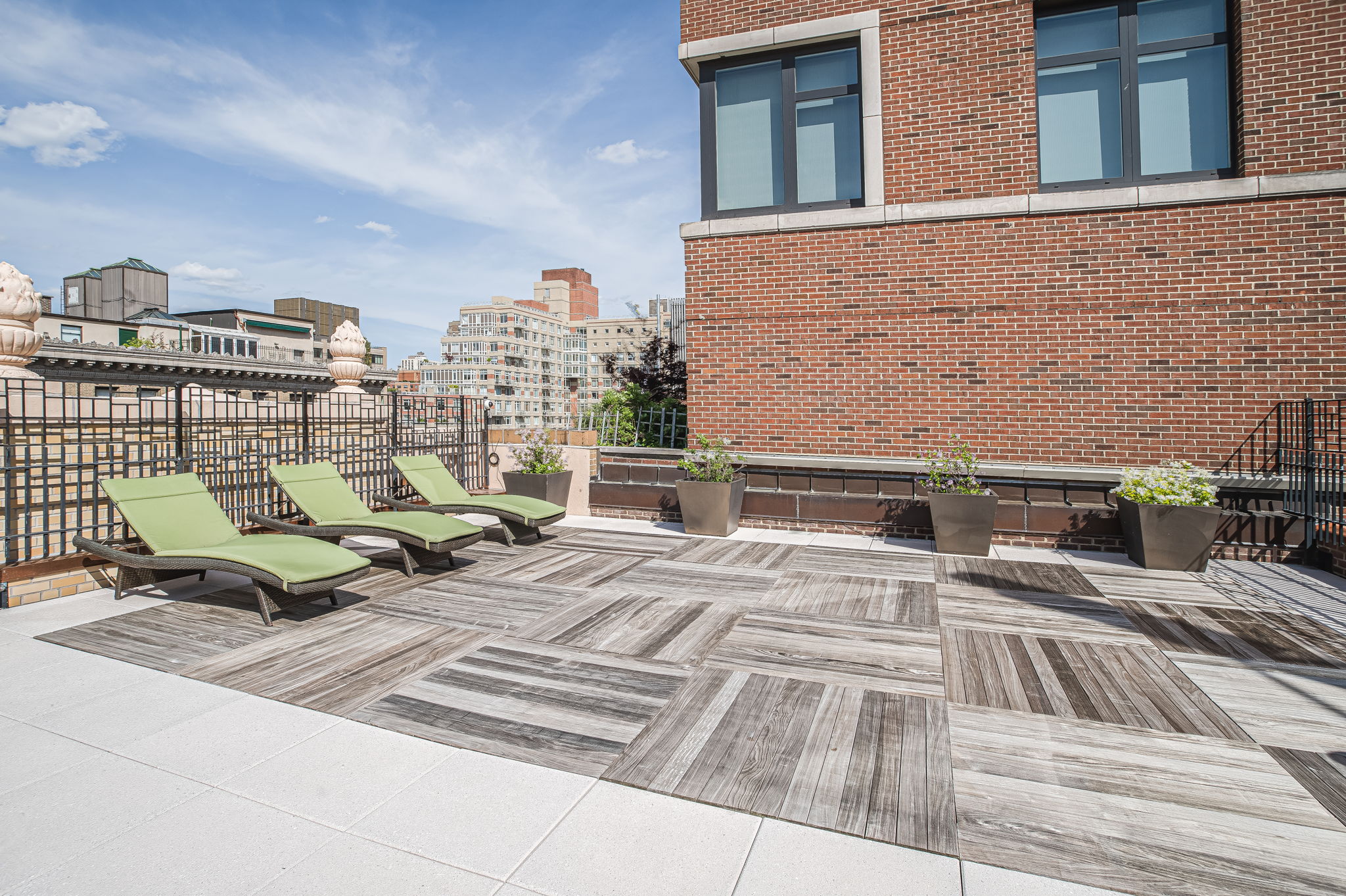 302 West 86th Street, Unit 11C Manhattan, NY 10024 - Photo 11 of 16 a view of roof deck with couch and outdoor seating