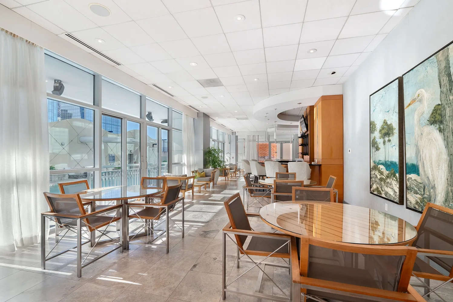a view of a house with a tree and center
