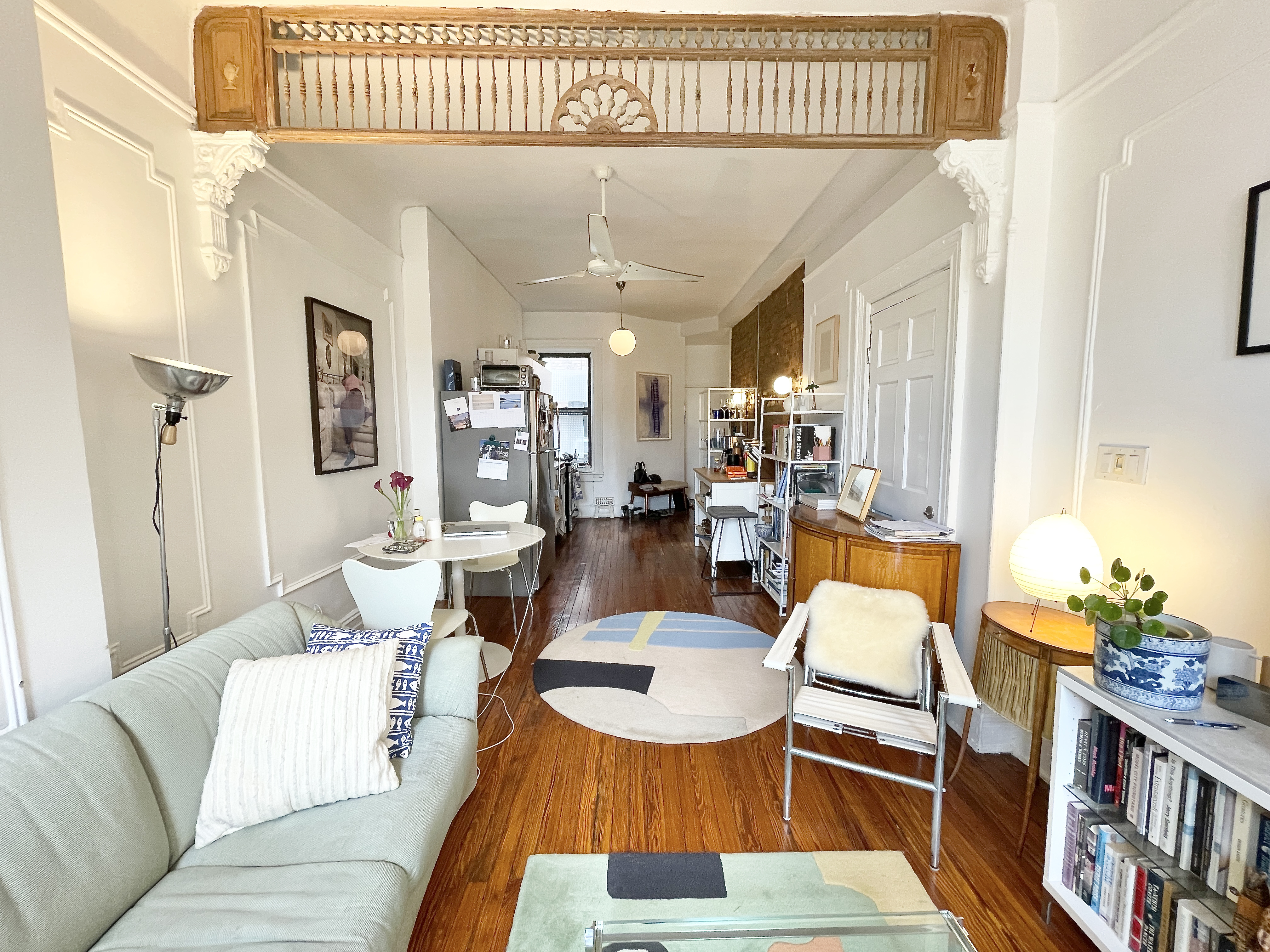 447 Jefferson Avenue, Unit 3L Brooklyn, NY 11221 - Photo 3 of 13 a living room with furniture a rug and a table