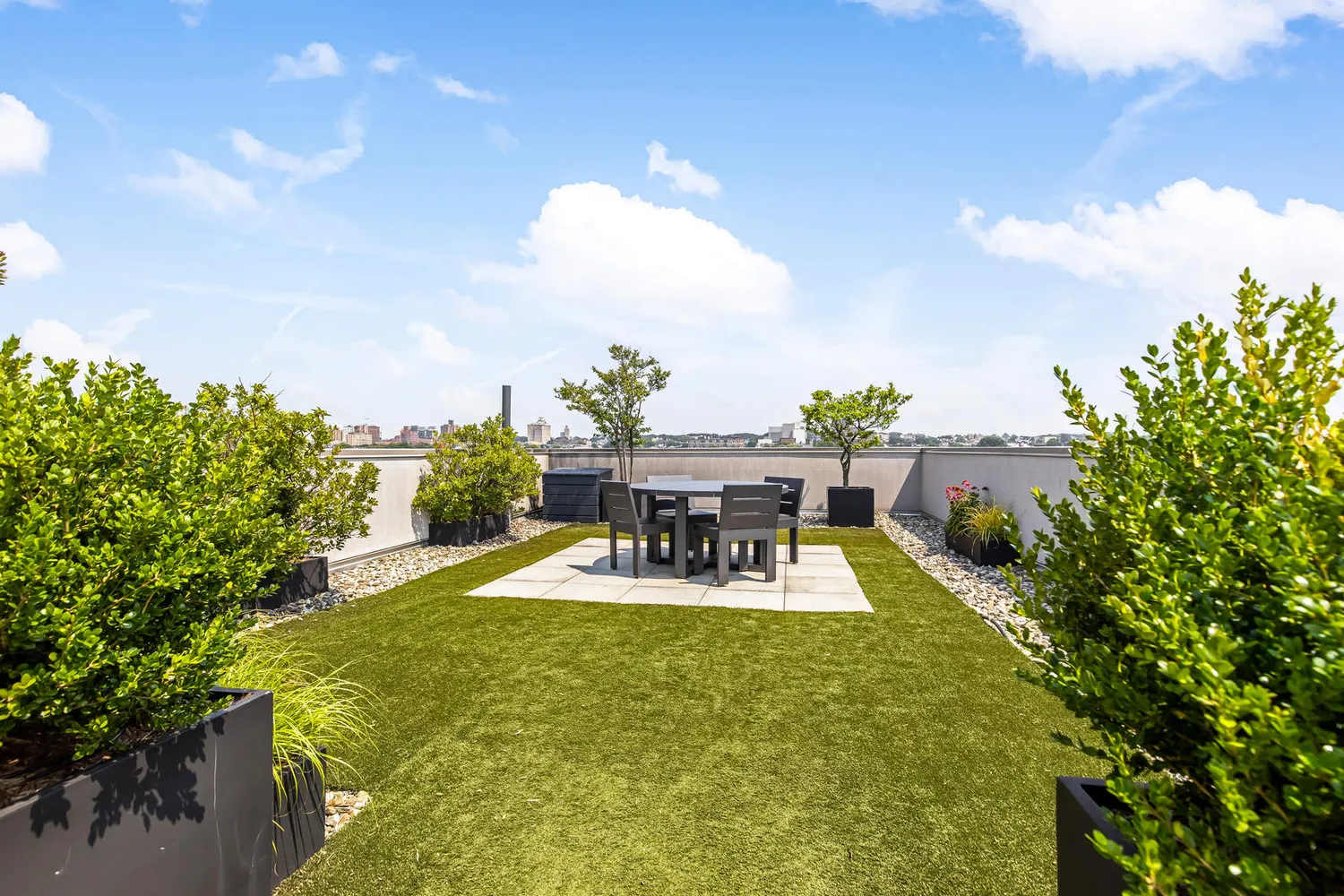 a view of a swimming pool with an outdoor seating