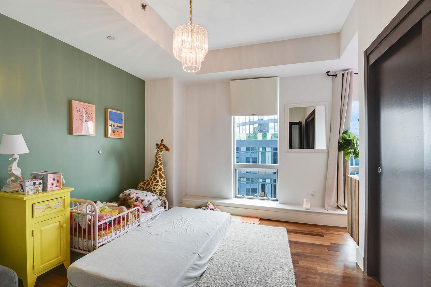 150 Myrtle Avenue, Unit PH3201 Brooklyn, NY 11201 - Photo 20 of 40 a bedroom with a bed and wooden floor