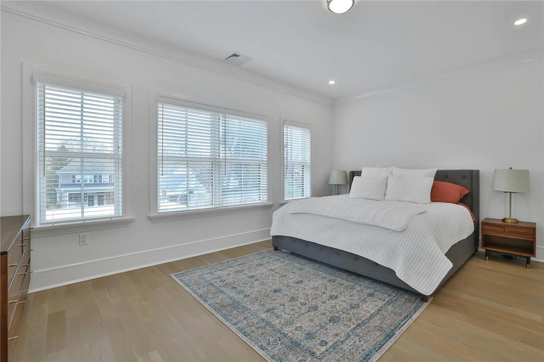 211 Purchase Street, Unit A Rye, NY 10580 - Photo 9 of 22 a bedroom with a large bed and a window