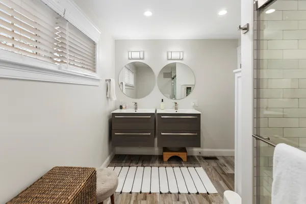 a bathroom with a shower and a toilet