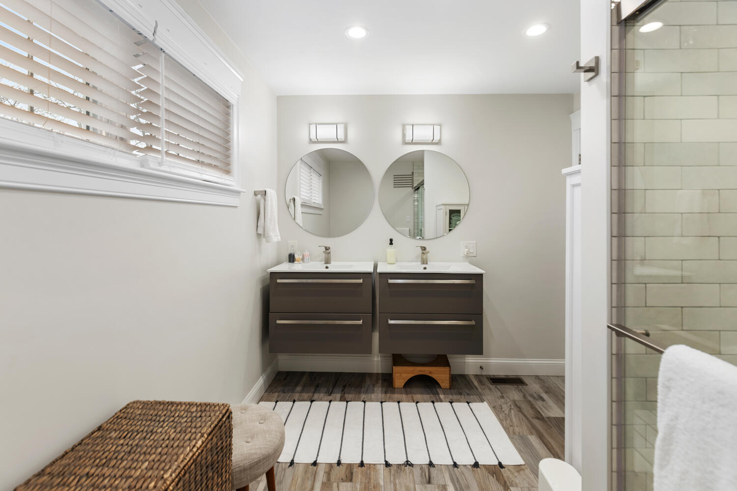 1 Maple Street, Unit 1 Maynard, MA 01754 - Photo 25 of 42 a room with a mirror and furniture