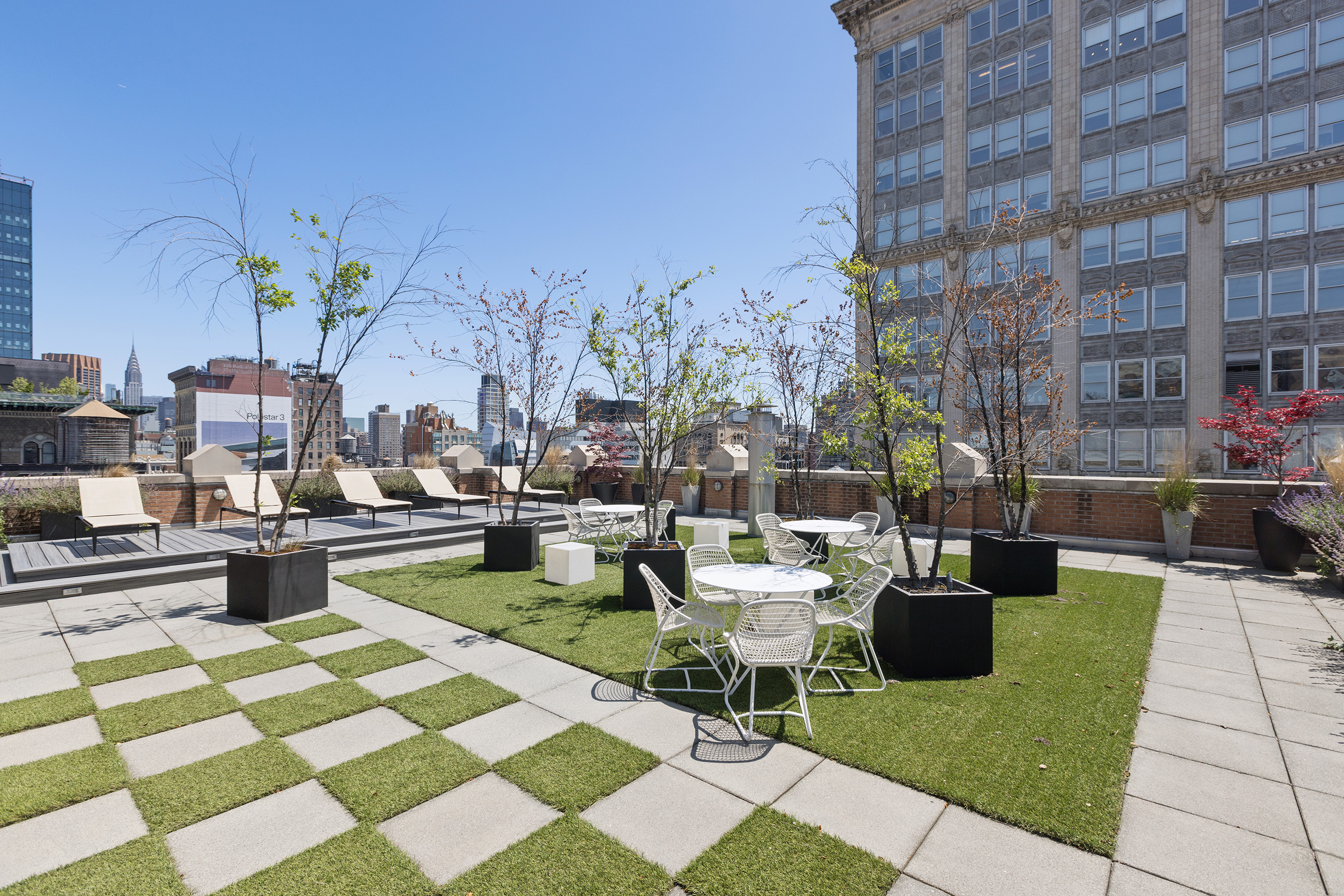 260 Park Avenue South, Unit 9G Manhattan, NY 10010 - Photo 14 of 17 a view of a patio with couches table and chairs and potted plants