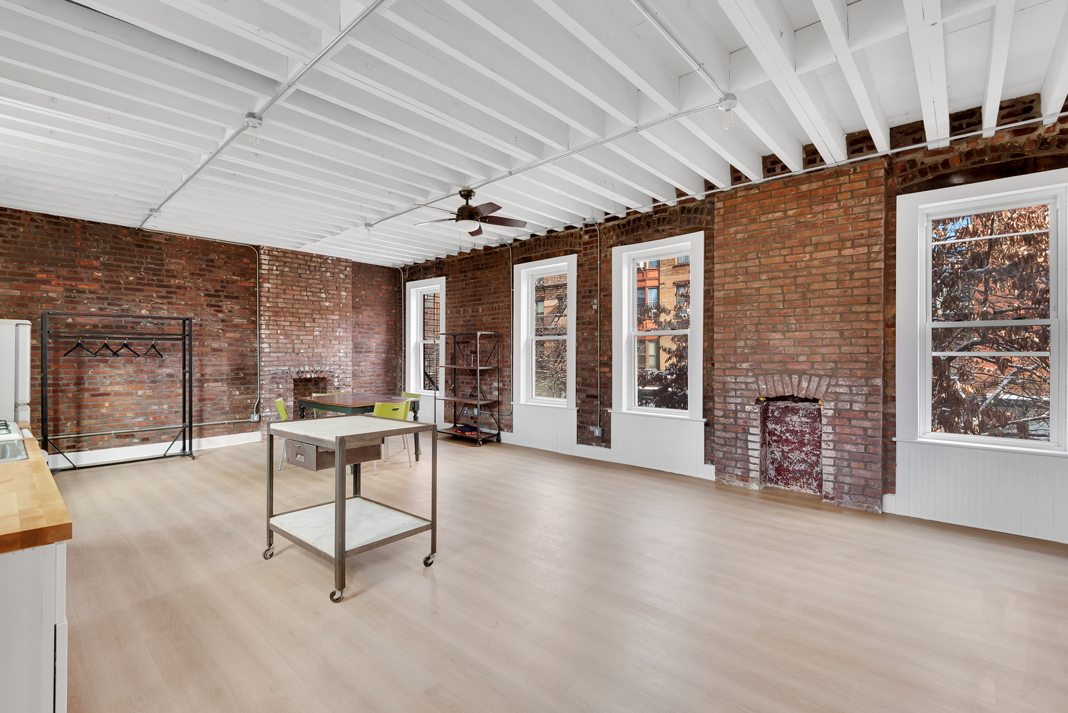 39 Clifton Place Brooklyn, NY 11238 - Photo 17 of 32 a view of a livingroom with furniture and a window