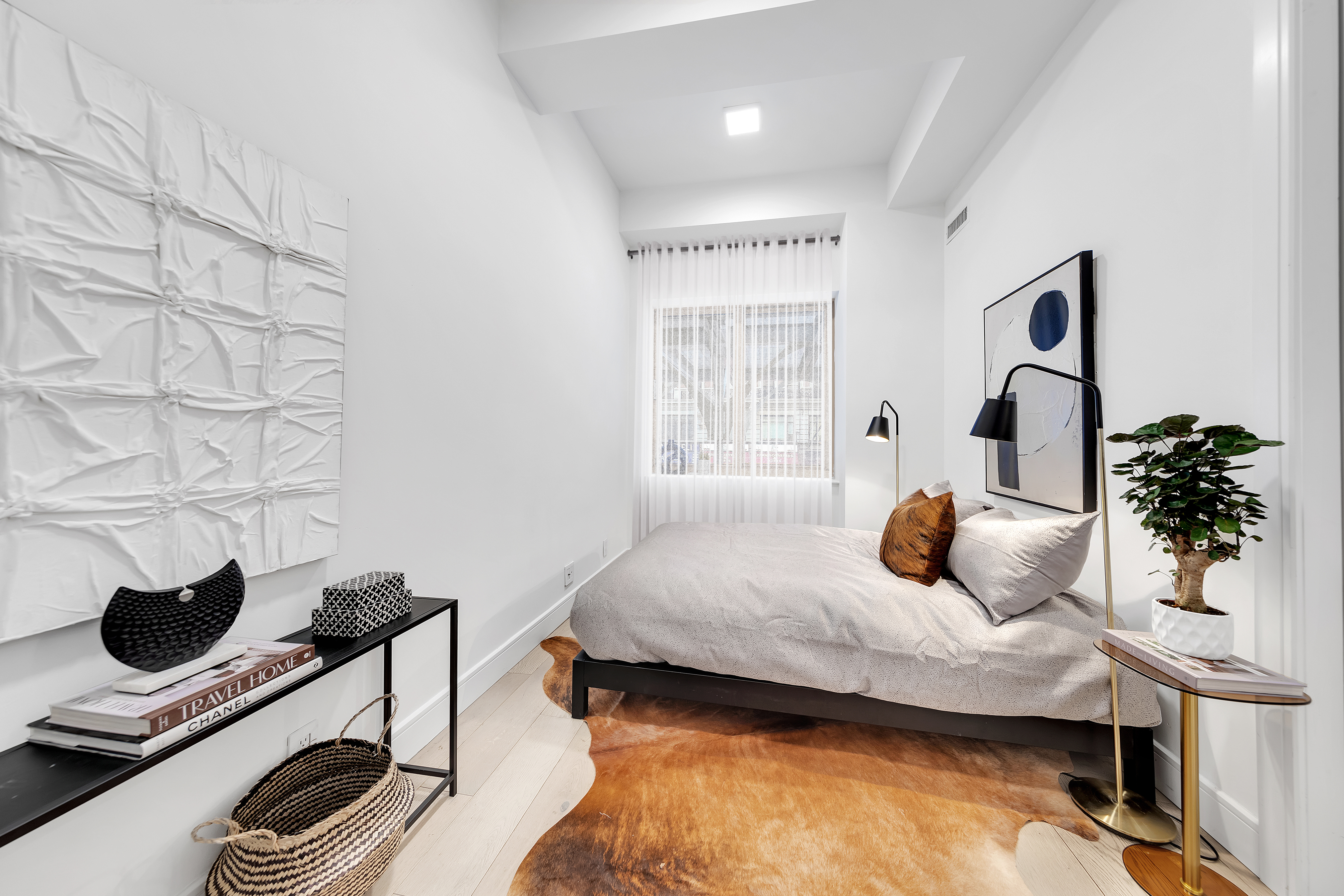 106 Central Park South, Unit 2B Manhattan, NY 10019 - Photo 4 of 12 a bedroom with a bed and a window