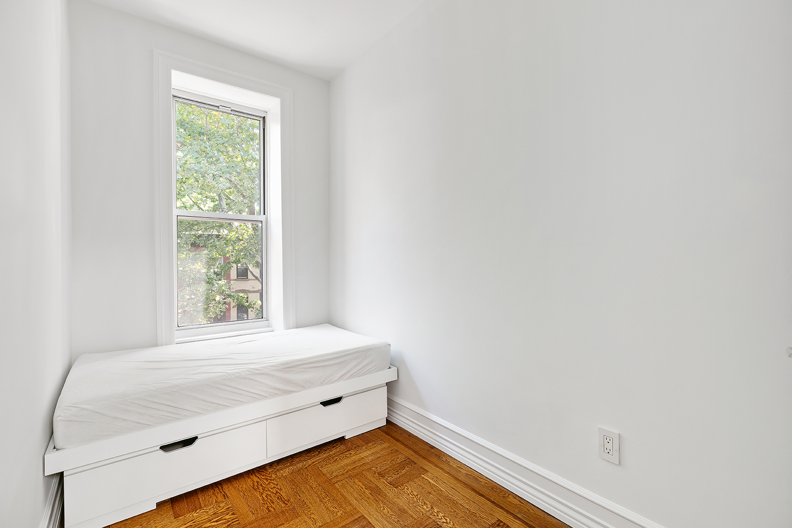 428 5th Street Brooklyn, NY 11215 - Photo 20 of 26 a view of an empty room and window