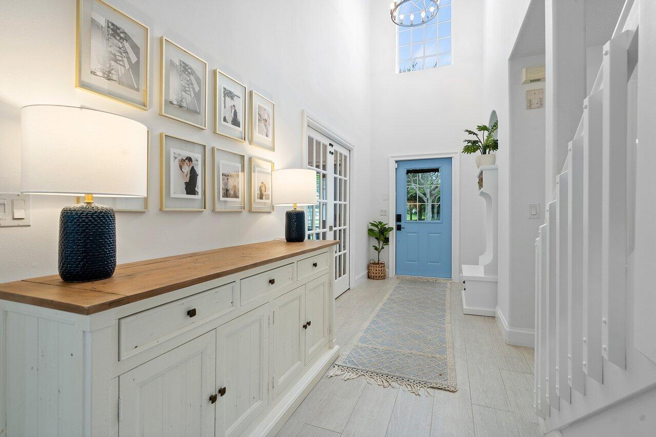 1182 Canoe Point Delray Beach, FL 33444 - Photo 6 of 46 a kitchen with cabinets and window