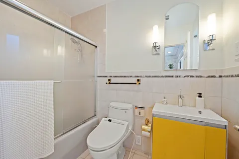 a living room with fireplace furniture and a wooden floor