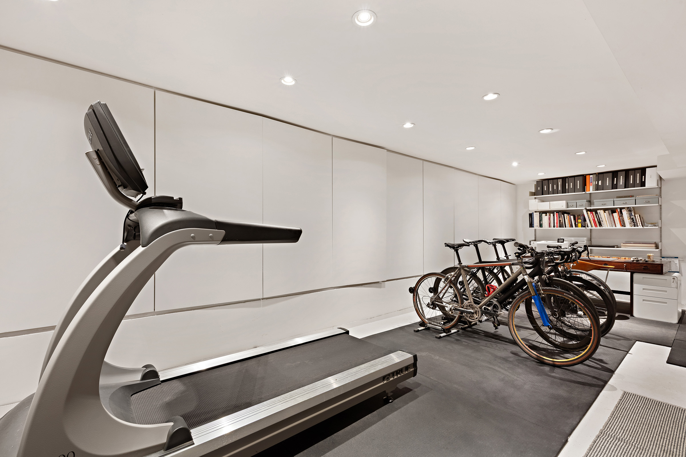 456 West 25th Street Manhattan, NY 10001 - Photo 21 of 22 a room with gym equipment