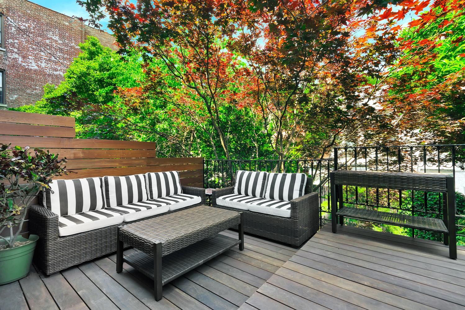 479 4th Street, Unit TRIPLEX Brooklyn, NY 11215 - Photo 6 of 17 a view of a wooden deck with a bench