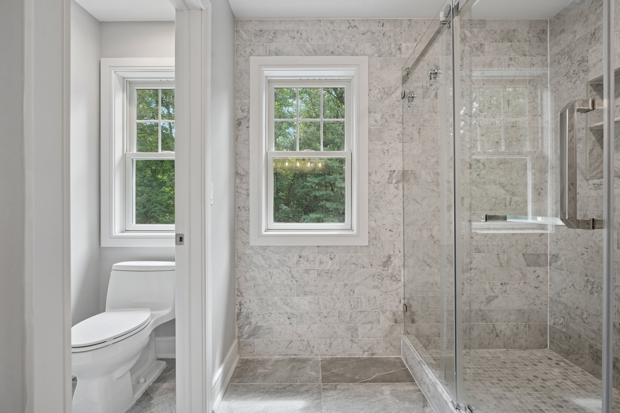 823 River Road Chatham, NJ 07928 - Photo 28 of 60 a bathroom with a toilet and a shower