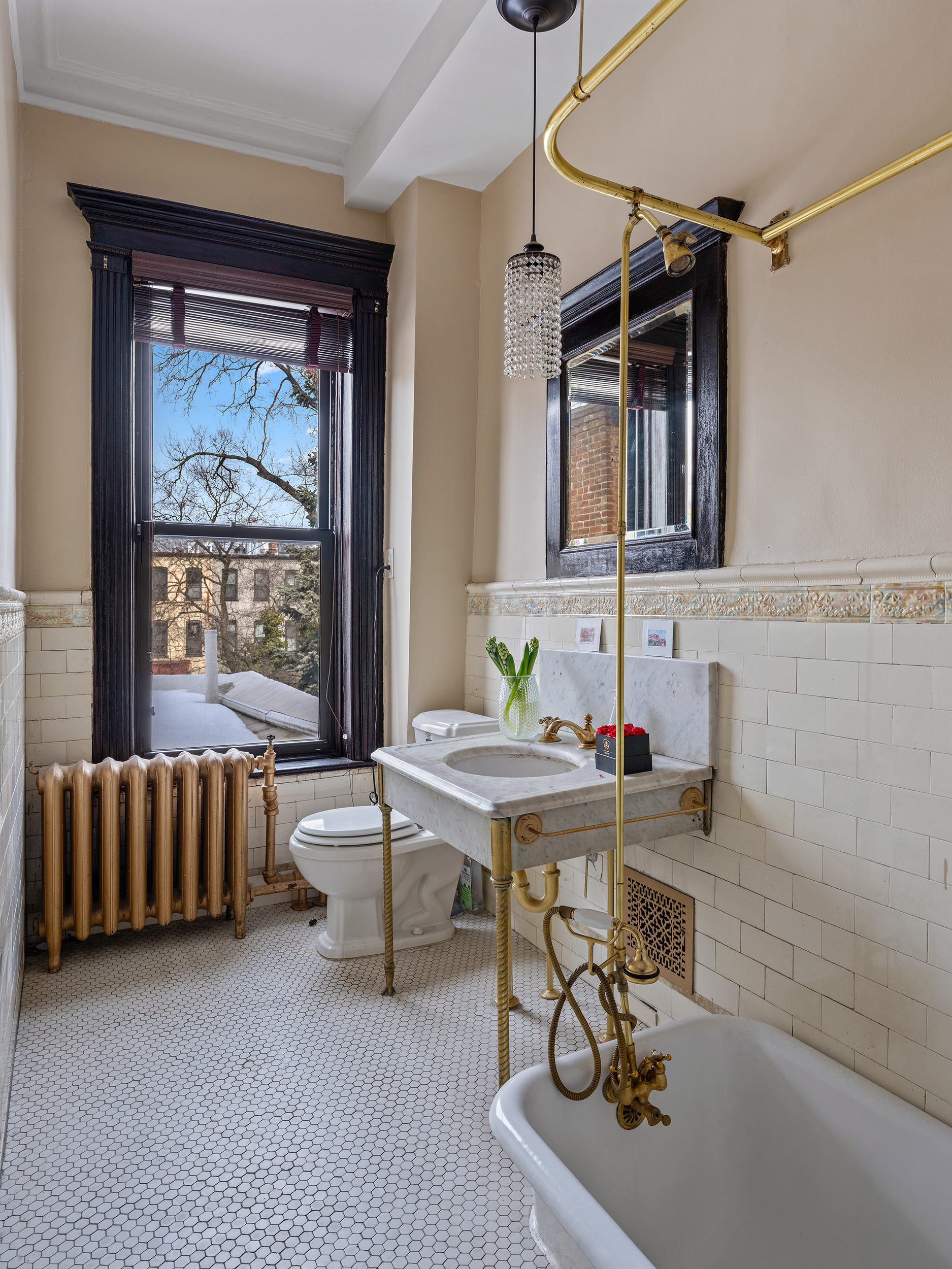 291 Sterling Place Brooklyn, NY 11238 - Photo 6 of 19 a view of a workspace with furniture and a window