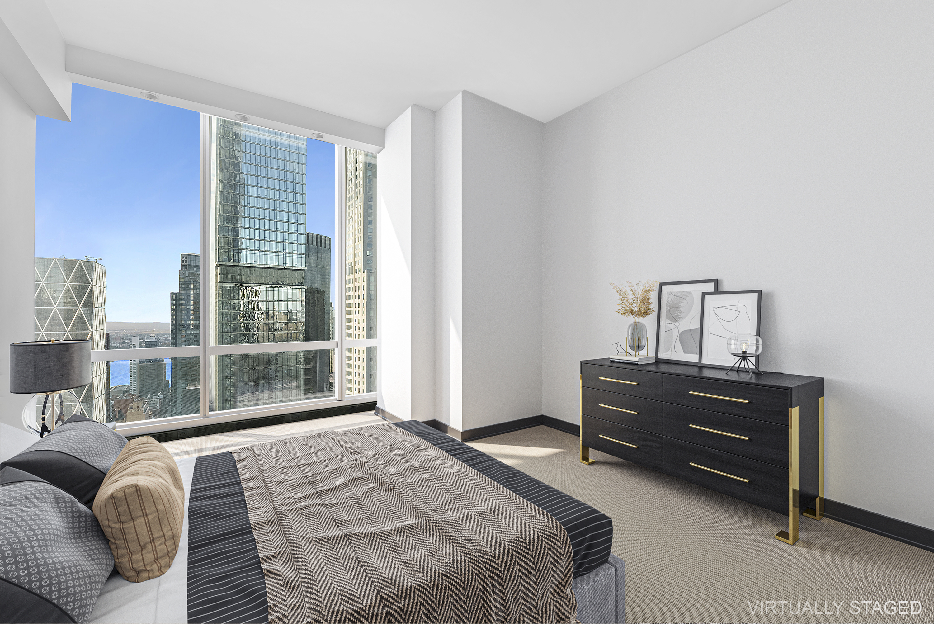 157 West 57th Street, Unit 49B Manhattan, NY 10019 - Photo 6 of 9 a bedroom with a bed window and a dresser
