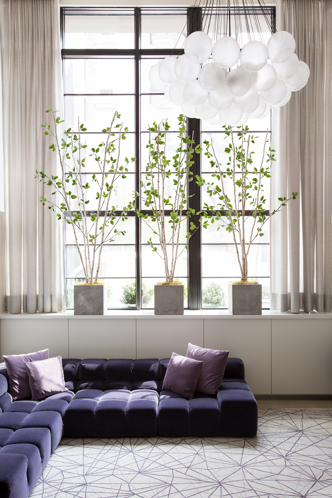 150 Charles Street, Unit M10 Manhattan, NY 10014 - Photo 8 of 34 a living room with furniture and a large window
