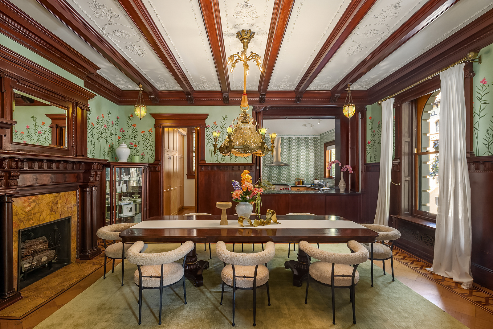 18 Prospect Park West Brooklyn, NY 11215 - Photo 11 of 33 a dining room with furniture a fireplace and chandelier
