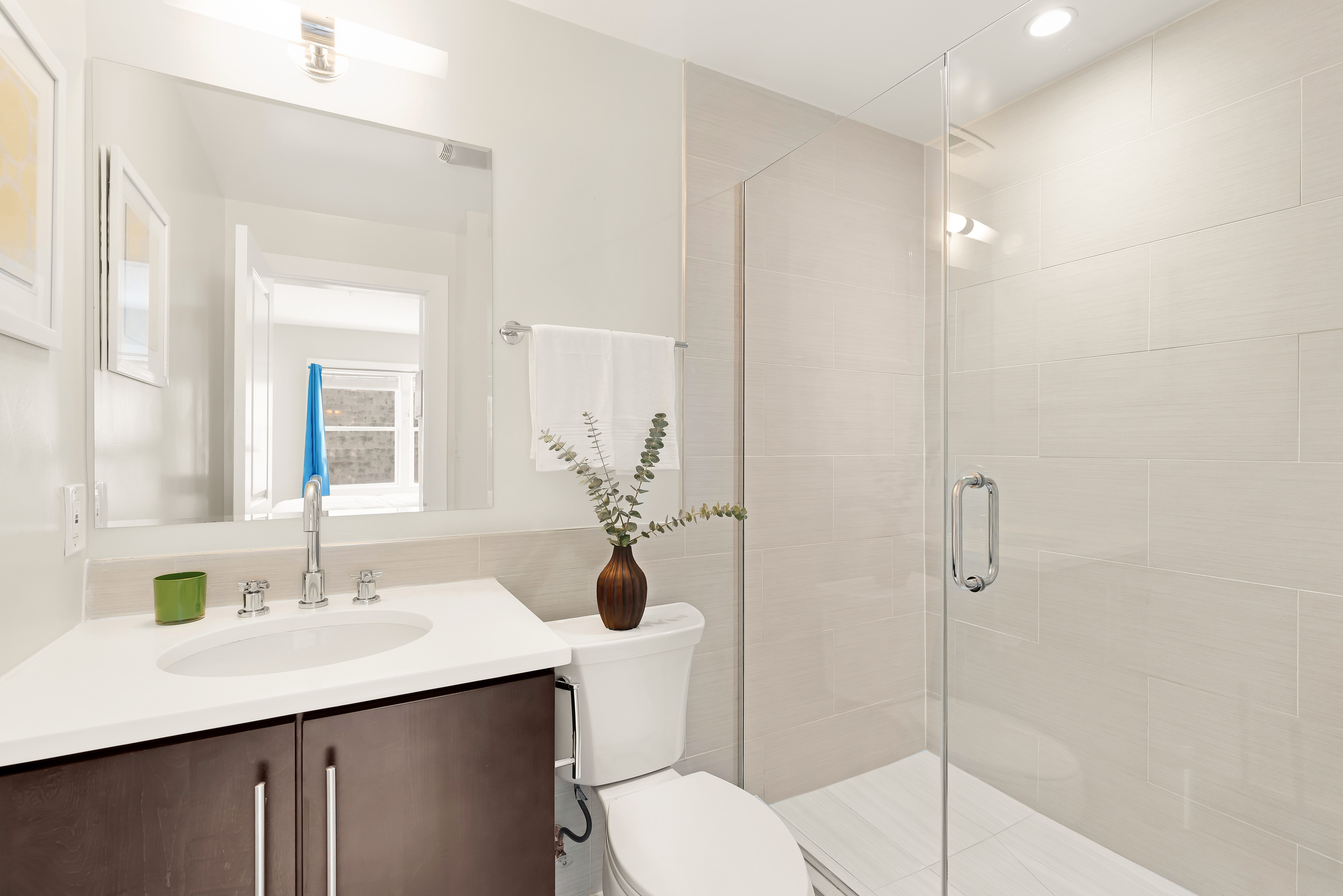 2101 11th Street Northwest, Unit 403 Washington, DC 20001 - Photo 21 of 30 a bathroom with a sink toilet and shower
