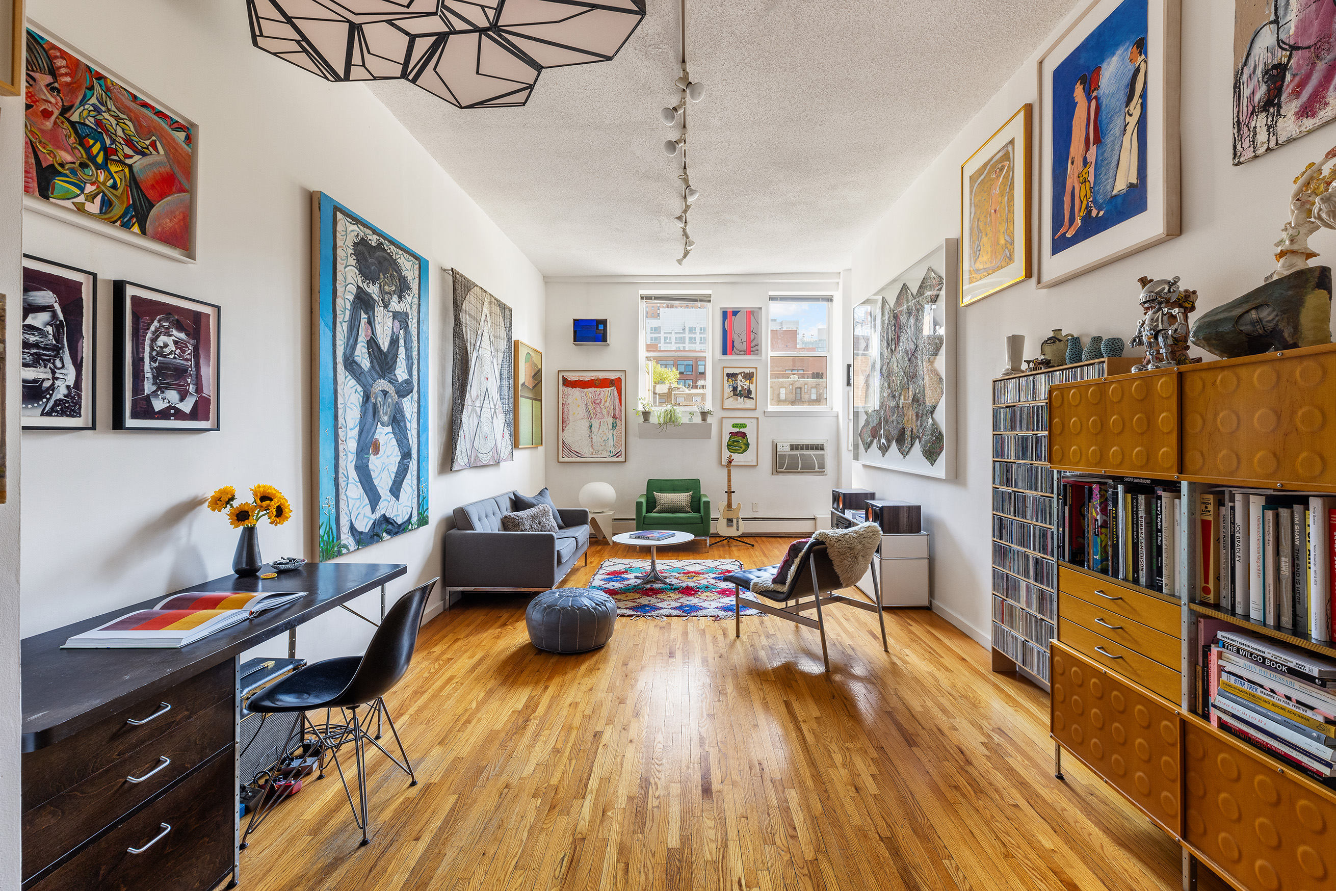 120 Boerum Place, Unit 2E Brooklyn, NY 11201 - Photo 2 of 13 a living room with lots of furniture and wooden floor