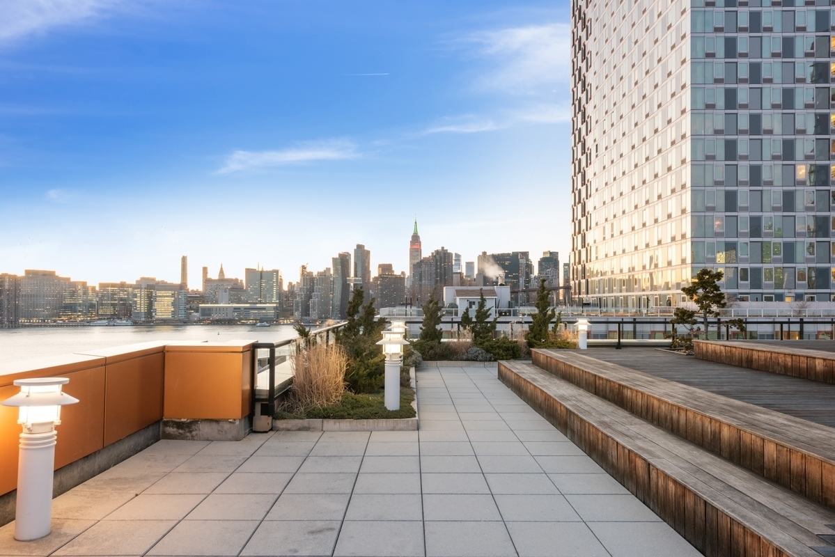 2-17 51st Avenue, Unit 606 Queens, NY 11101 - Photo 14 of 18 a view of lake with city view