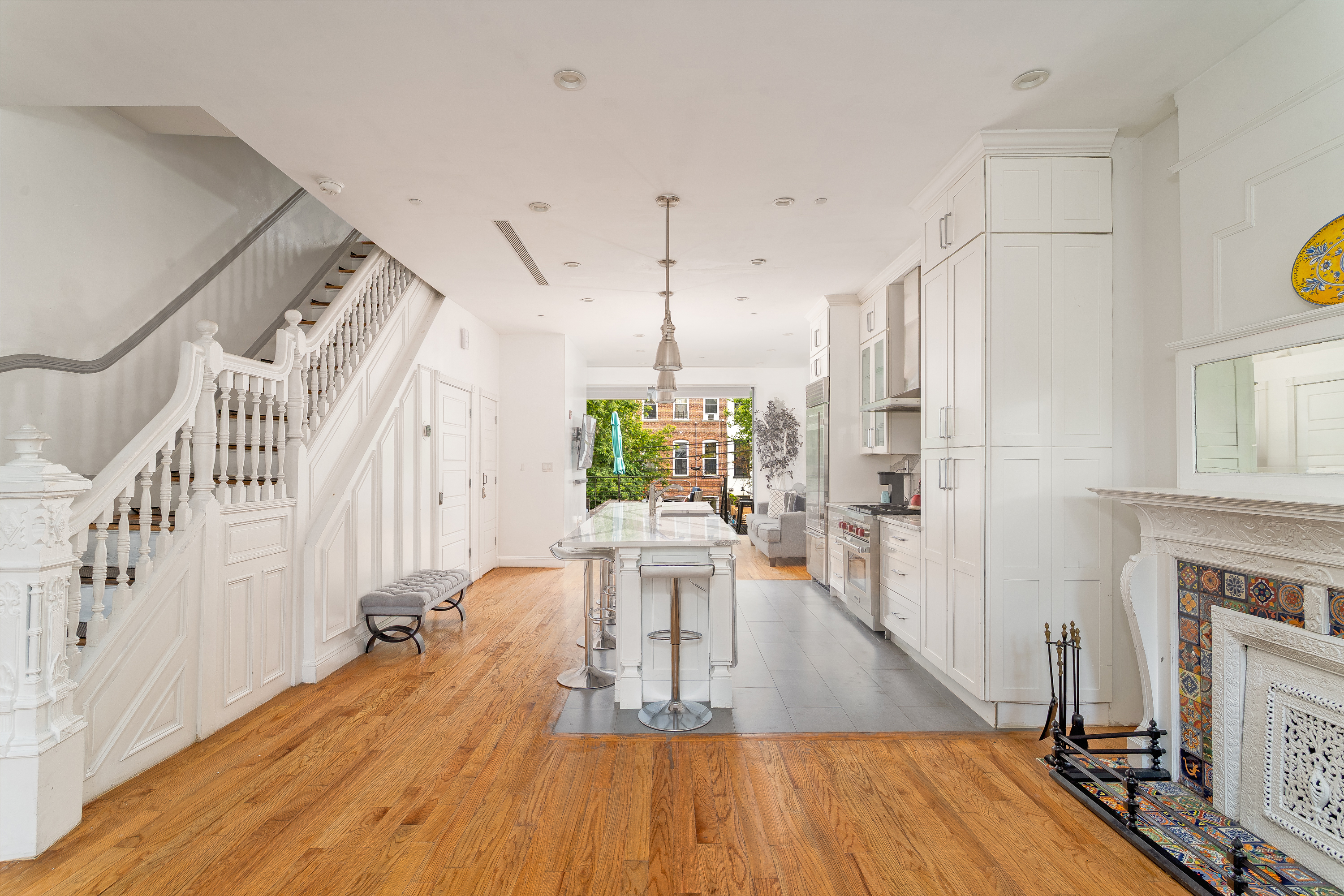 616 MacDonough Street, Unit 2 Brooklyn, NY 11233 - Photo 1 of 12 a view of a living room and a fireplace