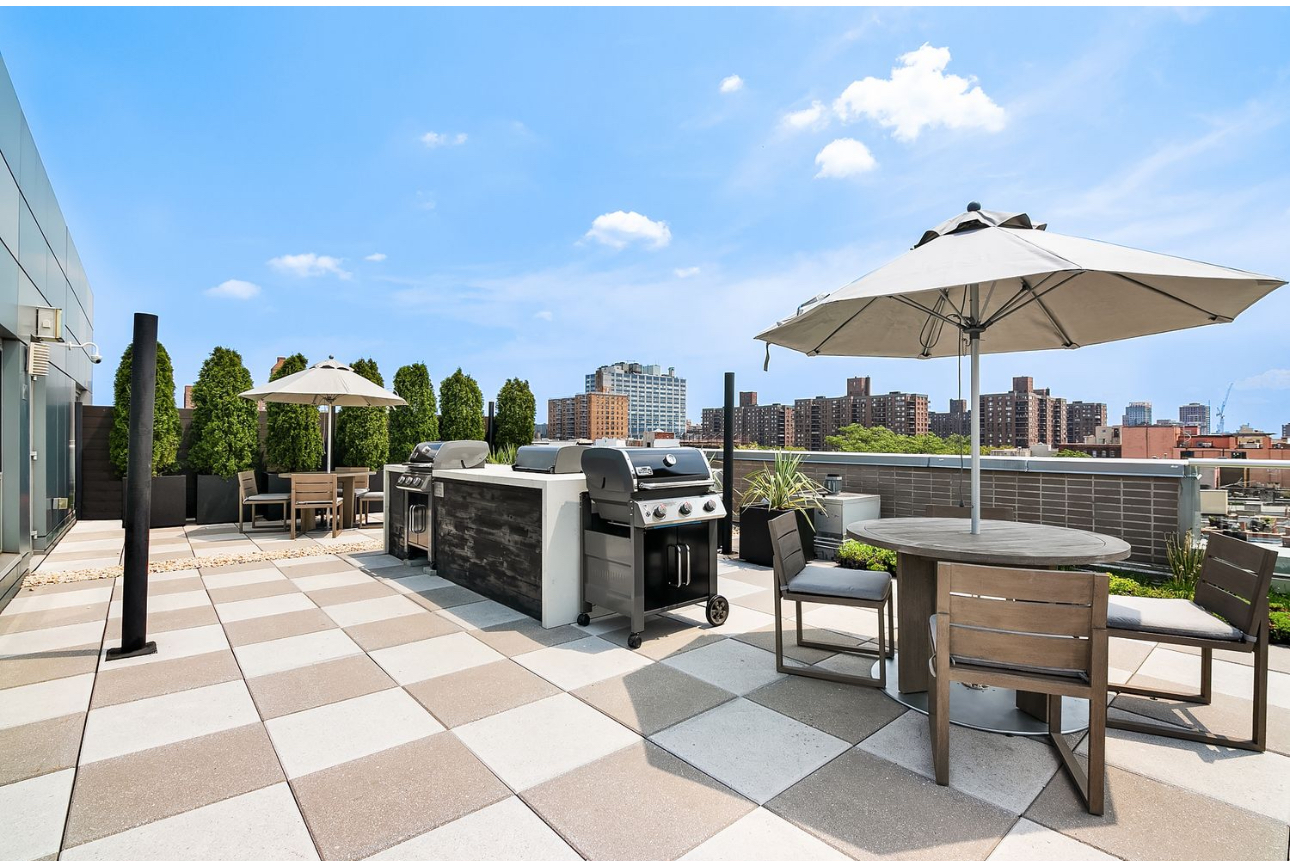 171 West 131st Street, Unit 303 Manhattan, NY 10027 - Photo 7 of 11 a view of a terrace with furniture and a garden